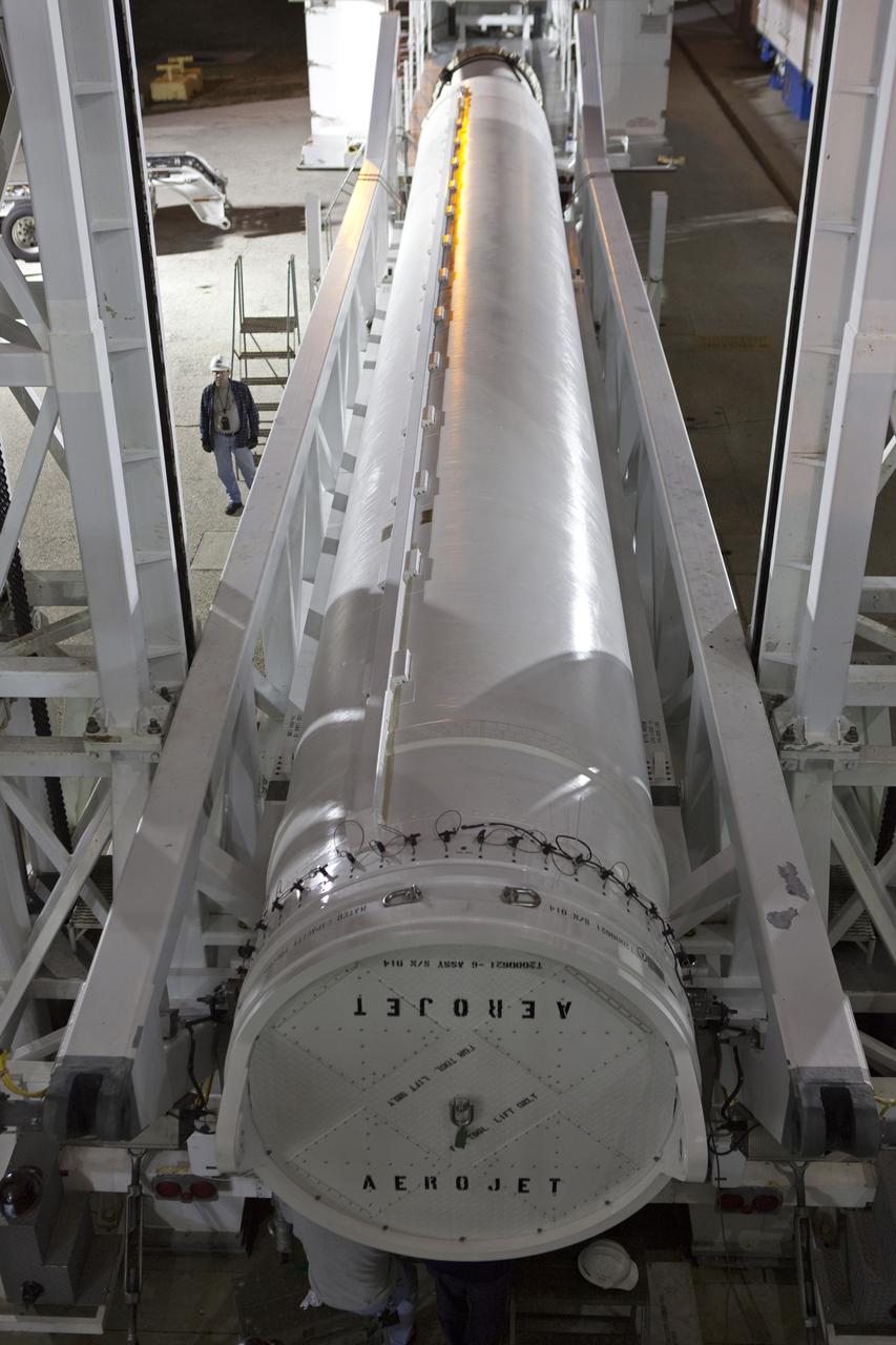 At the Vertical Integration Facility at Space Launch Complex 41 at Cape Canaveral Air Force Station in Florida, a solid rocket booster (SRB) is prepared for mating to a United Launch Alliance Atlas V first stage. The SRB will help boost NOAA's Geostationary Operational Environmental Satellite, or GOES-S, to orbit. GOES-S is the second in a series of four advanced geostationary weather satellites that will significantly improve the detection and observation of environmental phenomena that directly affect public safety, protection of property and the nation's economic health and prosperity. GOES-S is slated to launch March 1, 2018.