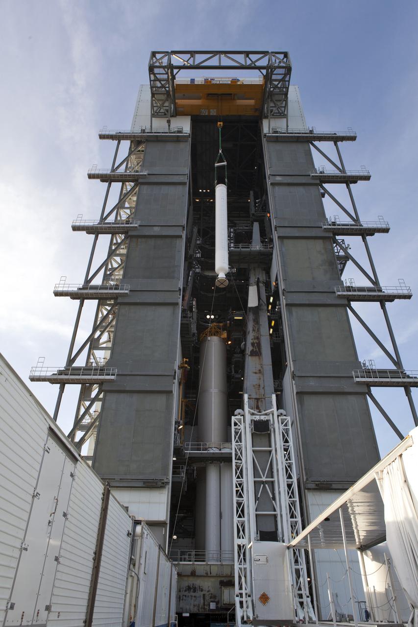 At the Vertical Integration Facility at Space Launch Complex 41 at Cape Canaveral Air Force Station in Florida, a solid rocket booster (SRB) is lifted by a crane for mating to a United Launch Alliance Atlas V first stage. The SRB will help boost NOAA's Geostationary Operational Environmental Satellite, or GOES-S, to orbit. GOES-S is the second in a series of four advanced geostationary weather satellites that will significantly improve the detection and observation of environmental phenomena that directly affect public safety, protection of property and the nation's economic health and prosperity. GOES-S is slated to launch March 1, 2018.