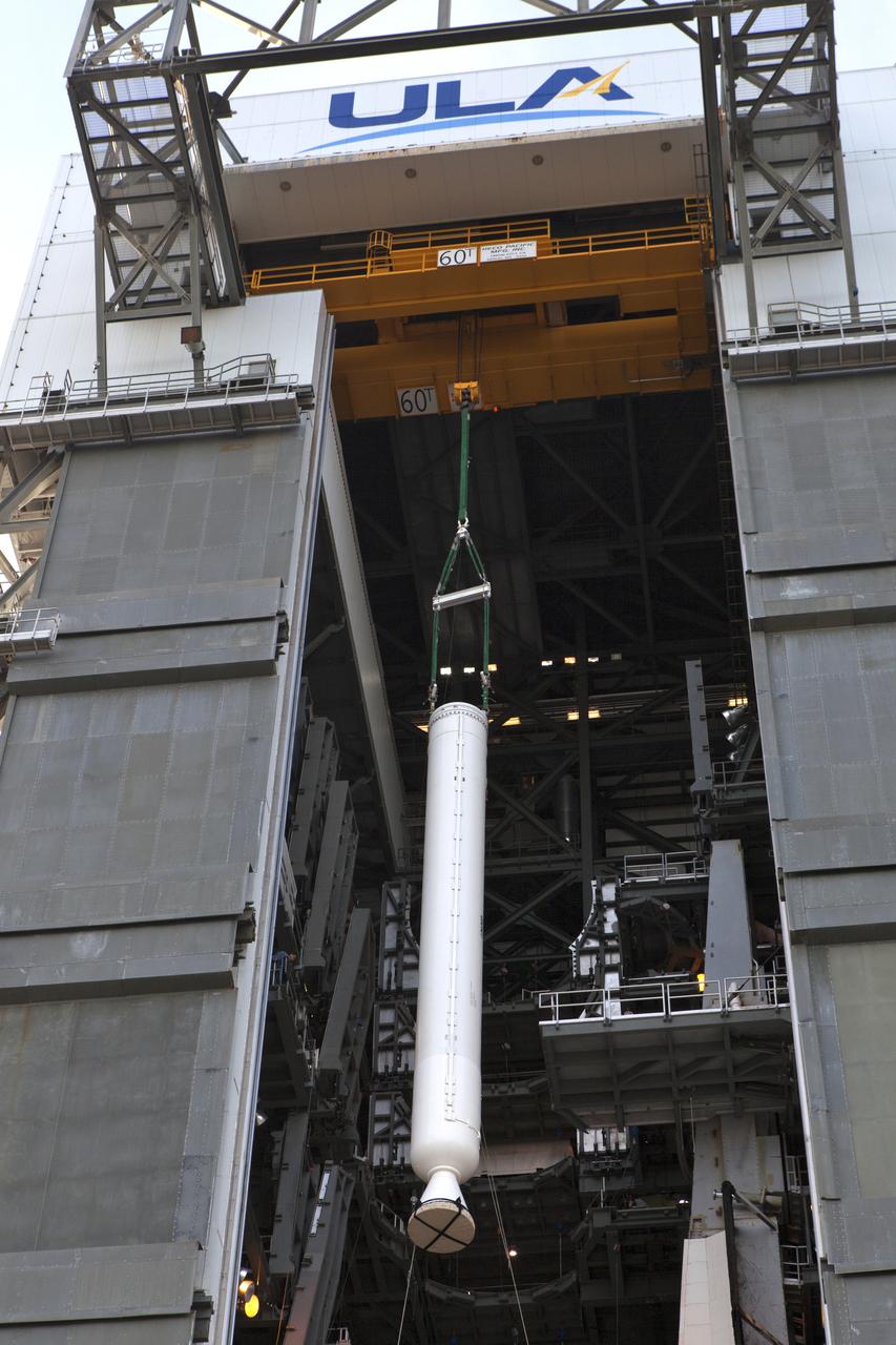 At the Vertical Integration Facility at Space Launch Complex 41 at Cape Canaveral Air Force Station in Florida, a solid rocket booster (SRB) is lifted by a crane for mating to a United Launch Alliance Atlas V first stage. The SRB will help boost NOAA's Geostationary Operational Environmental Satellite, or GOES-S, to orbit. GOES-S is the second in a series of four advanced geostationary weather satellites that will significantly improve the detection and observation of environmental phenomena that directly affect public safety, protection of property and the nation's economic health and prosperity. GOES-S is slated to launch March 1, 2018.
