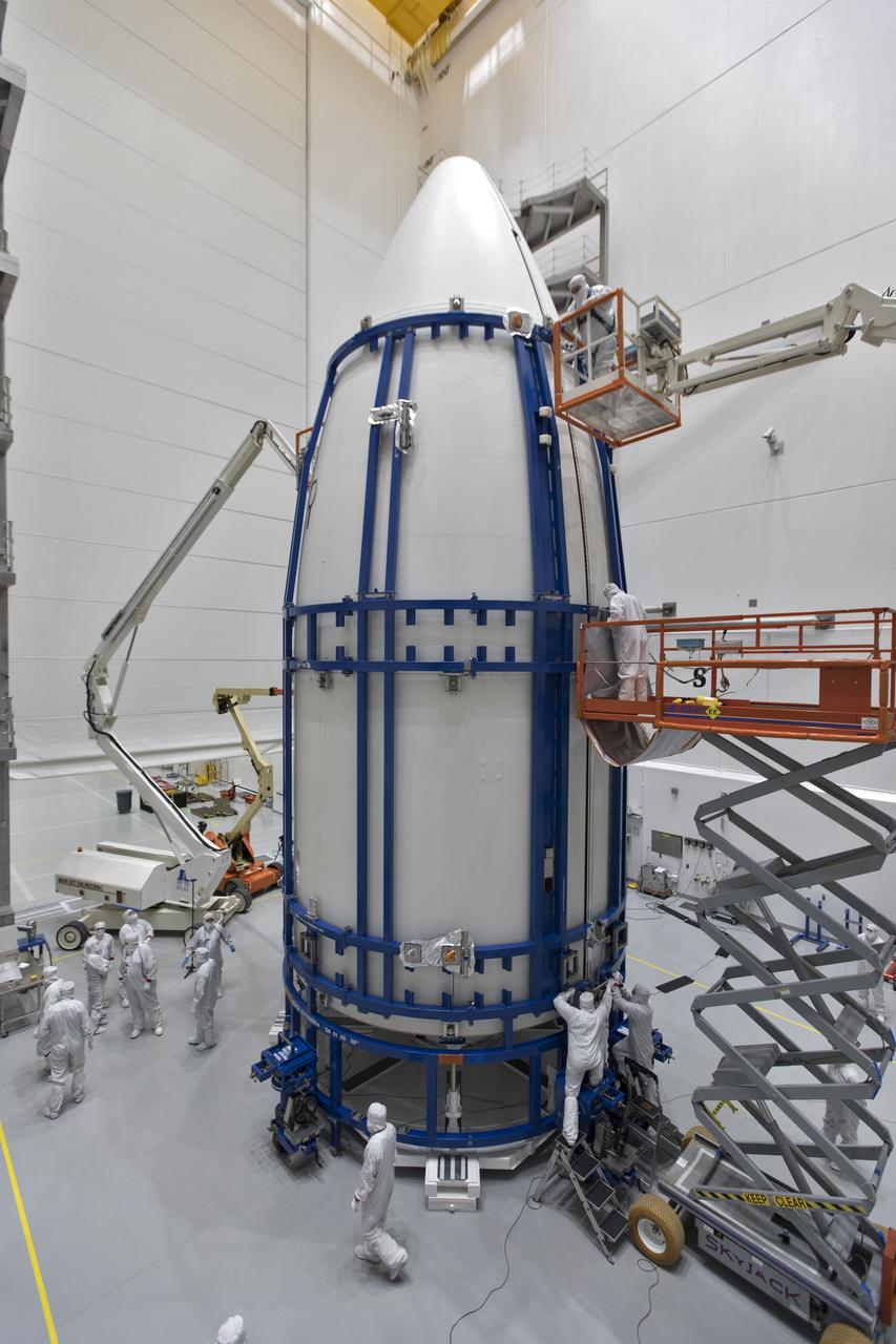 In a clean room at Astrotech Space Operations in Titusville, Florida, technicians and engineers monitor progress as NOAA's Geostationary Operational Environmental Satellite-S, or GOES-S, is encapsulated in its payload fairing. It soon will be moved to Space Launch Complex 41 at Cape Canaveral Air Force Station for mounting atop the Atlas V rocket that will boost the satellite to orbit. GOES-S is the second in a series of four advanced geostationary weather satellites that will significantly improve the detection and observation of environmental phenomena that directly affect public safety, protection of property and the nation's economic health and prosperity. GOES-S is slated to launch March 1, 2018 aboard a United Launch Alliance Atlas V rocket.
