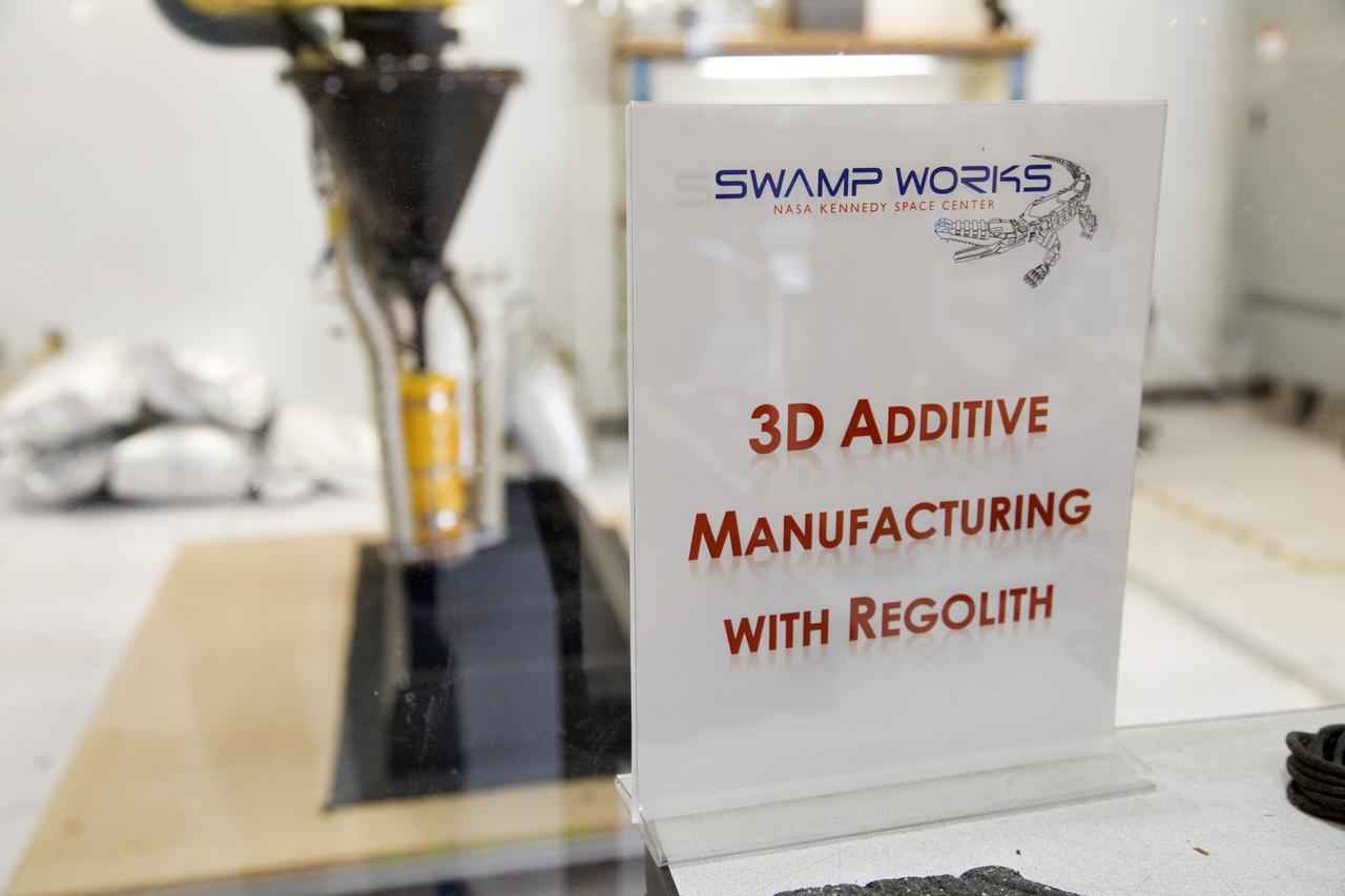 Research engineers at NASA's Kennedy Space Center in Florida are working on a Zero Launch Mass 3-D printer at the center's Swamp Works. The printer can be used for construction projects on the Moon and Mars, and even for troops in remote locations on Earth. Zero launch mass refers to the fact that the printer uses pellets made from simulated lunar regolith, or dirt, and polymers to prove that space explorers can use resources at their destination instead of taking everything with them, saving them launch mass and money. The group is working with Marshall Space Flight Center in Huntsville, Alabama, and the U.S. Army Corps of Engineers to develop a system that can 3-D print barracks in remote locations on Earth, using the resources they have where they are.