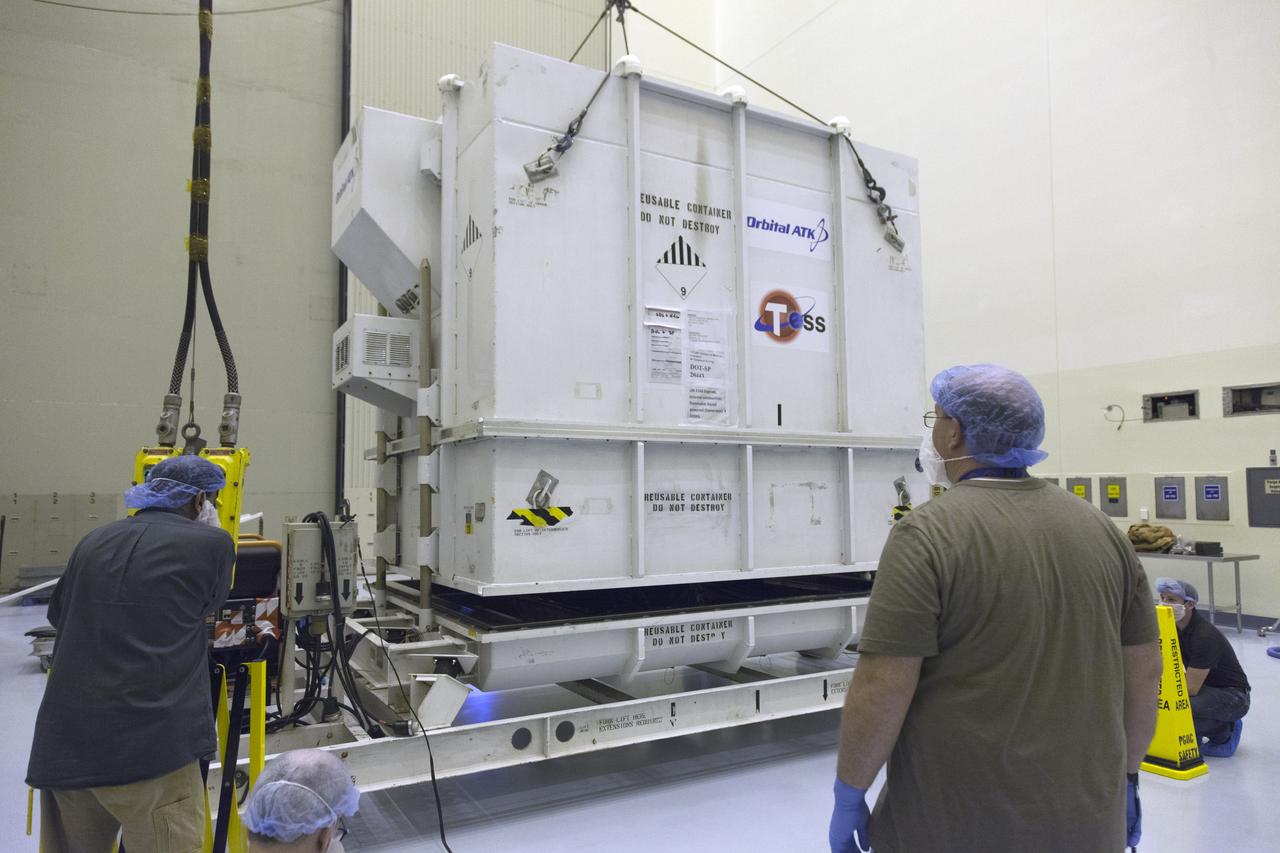 The shipping container with NASA's Transiting Exoplanet Survey Satellite (TESS) arrives inside the Payload Hazardous Servicing Facility at the agency's Kennedy Space Center in Florida. Inside the PHSF, TESS will be unpacked, lifted up and moved to a test stand for processing. TESS is scheduled to launch atop a SpaceX Falcon 9 rocket from Space Launch Complex 40 at Cape Canaveral Air Force Station. TESS is the next step in NASA's search for planets outside our solar system, known as exoplanets. TESS is a NASA Astrophysics Explorer mission led and operated by MIT in Cambridge, Massachusetts, and managed by NASA’s Goddard Space Flight Center in Greenbelt, Maryland. Dr. George Ricker of MIT’s Kavli Institute for Astrophysics and Space Research serves as principal investigator for the mission. Additional partners include Orbital ATK, NASA’s Ames Research Center, the Harvard-Smithsonian Center for Astrophysics and the Space Telescope Science Institute. More than a dozen universities, research institutes and observatories worldwide are participants in the mission. NASA’s Launch Services Program is responsible for launch management. 