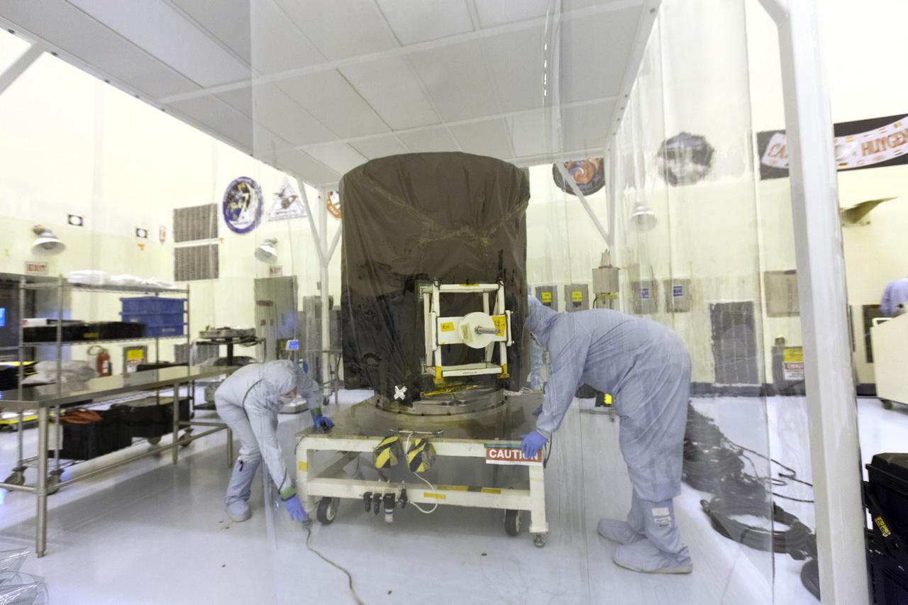 NASA's Transiting Exoplanet Survey Satellite (TESS), secured on a test stand, is moved into a clean room tent inside the Payload Hazardous Servicing Facility (PHSF) at the agency's Kennedy Space Center in Florida. Inside the PHSF, the satellite will be processed and prepared for its flight. TESS is scheduled to launch atop a SpaceX Falcon 9 rocket from Space Launch Complex 40 at Cape Canaveral Air Force Station. TESS is the next step in NASA's search for planets outside our solar system, known as exoplanets. TESS is a NASA Astrophysics Explorer mission led and operated by MIT in Cambridge, Massachusetts, and managed by NASA’s Goddard Space Flight Center in Greenbelt, Maryland. Dr. George Ricker of MIT’s Kavli Institute for Astrophysics and Space Research serves as principal investigator for the mission. Additional partners include Orbital ATK, NASA’s Ames Research Center, the Harvard-Smithsonian Center for Astrophysics and the Space Telescope Science Institute. More than a dozen universities, research institutes and observatories worldwide are participants in the mission. NASA’s Launch Services Program is responsible for launch management.