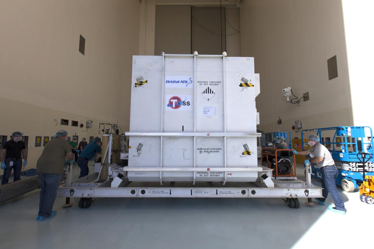 NASA's Transiting Exoplanet Survey Satellite (TESS), inside its shipping container, is moved into Payload Hazardous Servicing Facility (PHSF) at the agency's Kennedy Space Center in Florida. Inside the PHSF, the satellite will be processed and prepared for its flight. TESS is scheduled to launch atop a SpaceX Falcon 9 rocket from Space Launch Complex 40 at Cape Canaveral Air Force Station. TESS is the next step in NASA's search for planets outside our solar system, known as exoplanets. TESS is a NASA Astrophysics Explorer mission led and operated by MIT in Cambridge, Massachusetts, and managed by NASA’s Goddard Space Flight Center in Greenbelt, Maryland. Dr. George Ricker of MIT’s Kavli Institute for Astrophysics and Space Research serves as principal investigator for the mission. Additional partners include Orbital ATK, NASA’s Ames Research Center, the Harvard-Smithsonian Center for Astrophysics and the Space Telescope Science Institute. More than a dozen universities, research institutes and observatories worldwide are participants in the mission. NASA’s Launch Services Program is responsible for launch management. 