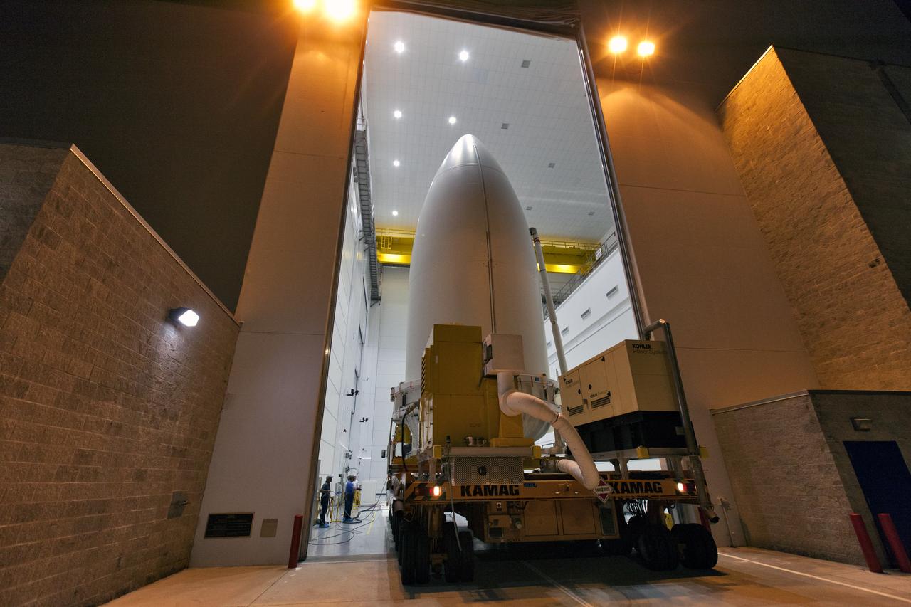 The payload fairing containing NOAA's Geostationary Operational Environmental Satellite-S (GOES-S) is secured on a transporter and moved out of the Astrotech Space Operations facility in Titusville, Florida. GOES-S will be transported to the United Launch Alliance (ULA) Vertical Integration Facility at Space Launch Complex 41 at Cape Canaveral Air Force Station in Florida. The payload fairing will be lifted and mated to the ULA Atlas V rocket. GOES-S is the second in a series of four advanced geostationary weather satellites. GOES-S is slated to launch aboard the ULA Atlas V on March 1. 