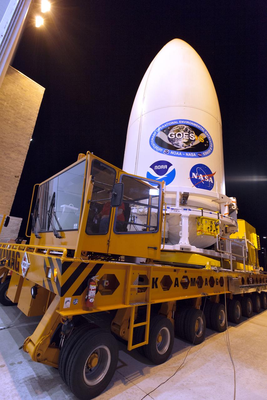 The payload fairing containing NOAA's Geostationary Operational Environmental Satellite-S (GOES-S) is secured on a transporter and moved out of the Astrotech Space Operations facility in Titusville, Florida. GOES-S will be transported to the United Launch Alliance (ULA) Vertical Integration Facility at Space Launch Complex 41 at Cape Canaveral Air Force Station in Florida. The payload fairing will be lifted and mated to the ULA Atlas V rocket. GOES-S is the second in a series of four advanced geostationary weather satellites. GOES-S is slated to launch aboard the ULA Atlas V on March 1. 