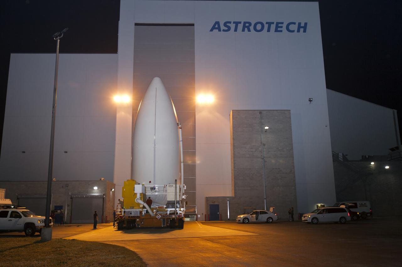 Secured on a transporter, the payload fairing containing NOAA's Geostationary Operational Environmental Satellite-S (GOES-S) departs the Astrotech Space Operations facility in Titusville, Florida. GOES-S will be transported to the United Launch Alliance (ULA) Vertical Integration Facility at Space Launch Complex 41 at Cape Canaveral Air Force Station in Florida. The payload fairing will be lifted and mated to the ULA Atlas V rocket. GOES-S is the second in a series of four advanced geostationary weather satellites. GOES-S is slated to launch aboard the ULA Atlas V on March 1. 