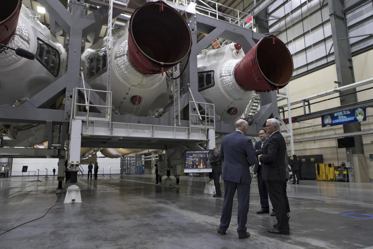 United Launch Alliance (ULA) president and CEO Tory Bruno, left leads a tour for Vice President Mike Pence on Feb. 20, 2018. Behind them is Acting NASA Administrator Robert Lightfoot. They are in the ULA Horizontal Integration Facility (HIF), at Cape Canaveral Air Force Station in Florida. The HIF is where the Delta IV Heavy boosters are being processed for NASA’s upcoming Parker Solar Probe mission. During his visit, Pence will chair a meeting of the National Space Council on Feb. 21, 2018 in the high bay of NASA Kennedy Space Center’s Space Station Processing Facility. The council's role is to advise the president regarding national space policy and strategy, and review the nation's long-range goals for space activities.