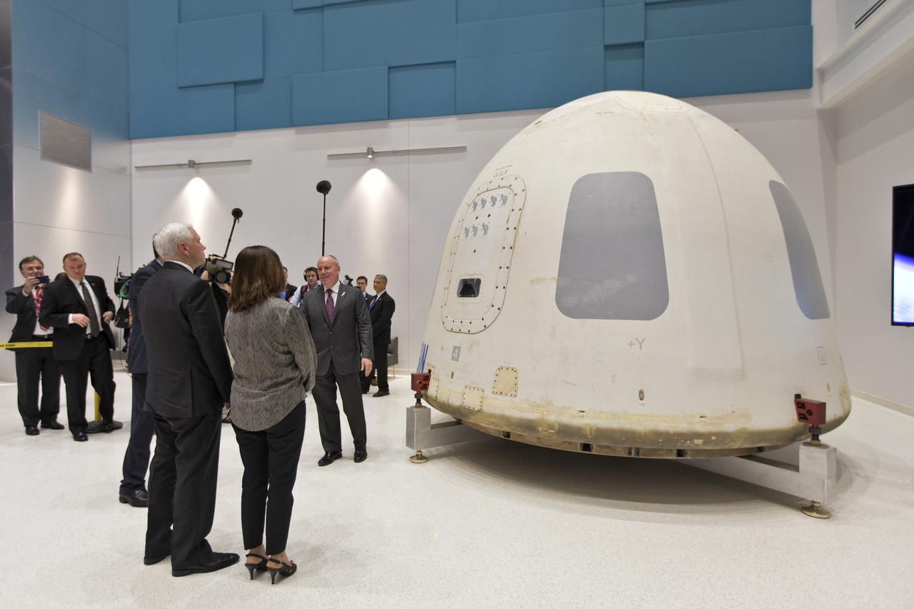 Vice President Mike Pence, second from right, and his wife, Karen Pence, tour the Blue Origin Manufacturing Facility near NASA's Kennedy Space Center in Florida, on Feb. 20, 2018. Vice President Pence viewed the flown New Shepard Booster and Crew Capsule. The Crew Capsule, in view, flew seven times, including a pad abort test and an escape test at maximum dynamic pressure. During his visit, Pence will chair a meeting of the National Space Council on Feb. 21, 2018 in the high bay of NASA Kennedy Space Center's Space Station Processing Facility. The council's role is to advise the president regarding national space policy and strategy, and review the nation's long-range goals for space activities. 