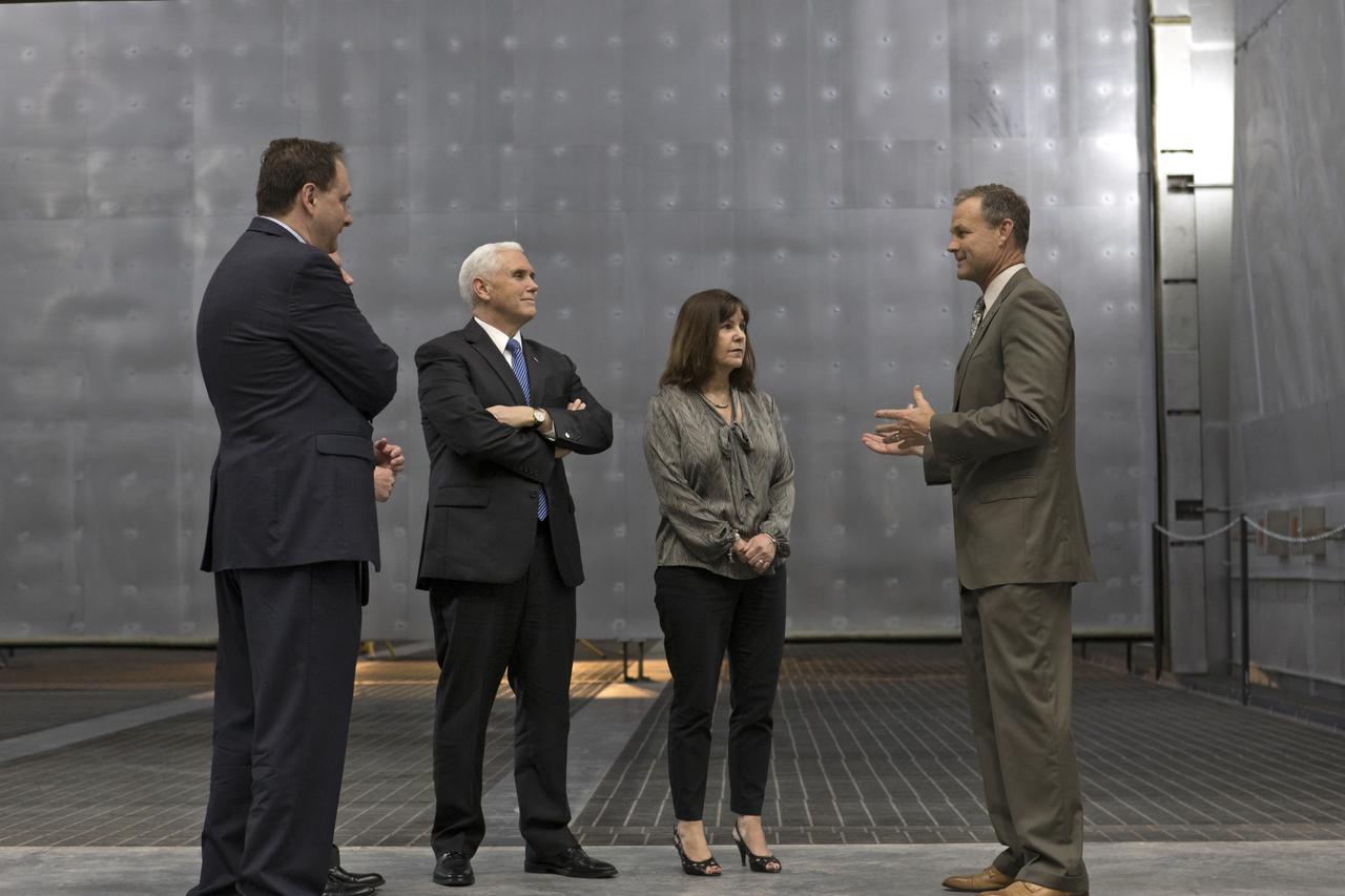 Vice President Mike Pence, second from left, tours the Blue Origin Manufacturing Facility near NASA's Kennedy Space Center in Florida, on Feb. 20, 2018. To his left is acting NASA Administrator Robert Lightfoot. At right is the vice president's wife, Karen Pence. At far right is Scott Henderson, Blue Origin director of Test and Flight Operations. Vice President Pence viewed the flown New Shepard Booster and Crew Capsule. The booster was the first launch vehicle with a successful vertical takeoff and vertical landing to demonstrate reusability. During his visit, Pence will chair a meeting of the National Space Council on Feb. 21, 2018 in the high bay of NASA Kennedy Space Center's Space Station Processing Facility. The council's role is to advise the president regarding national space policy and strategy, and review the nation's long-range goals for space activities.