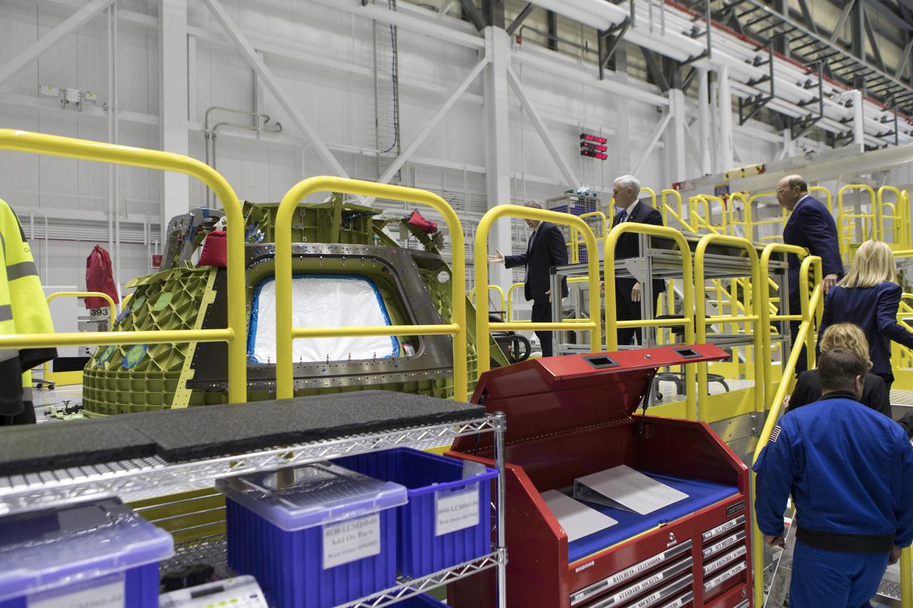 Vice President Mike Pence views Boeing’s Starliner spacecraft for the Crew Flight Test during a tour of the company’s Commercial Crew and Cargo Processing Facility at NASA's Kennedy Space Center in Florida, on Feb. 21, 2018. During his visit, Pence chaired a meeting of the National Space Council in the high bay of the center's Space Station Processing Facility. The council's role is to advise the president regarding national space policy and strategy, and review the nation's long-range goals for space activities.