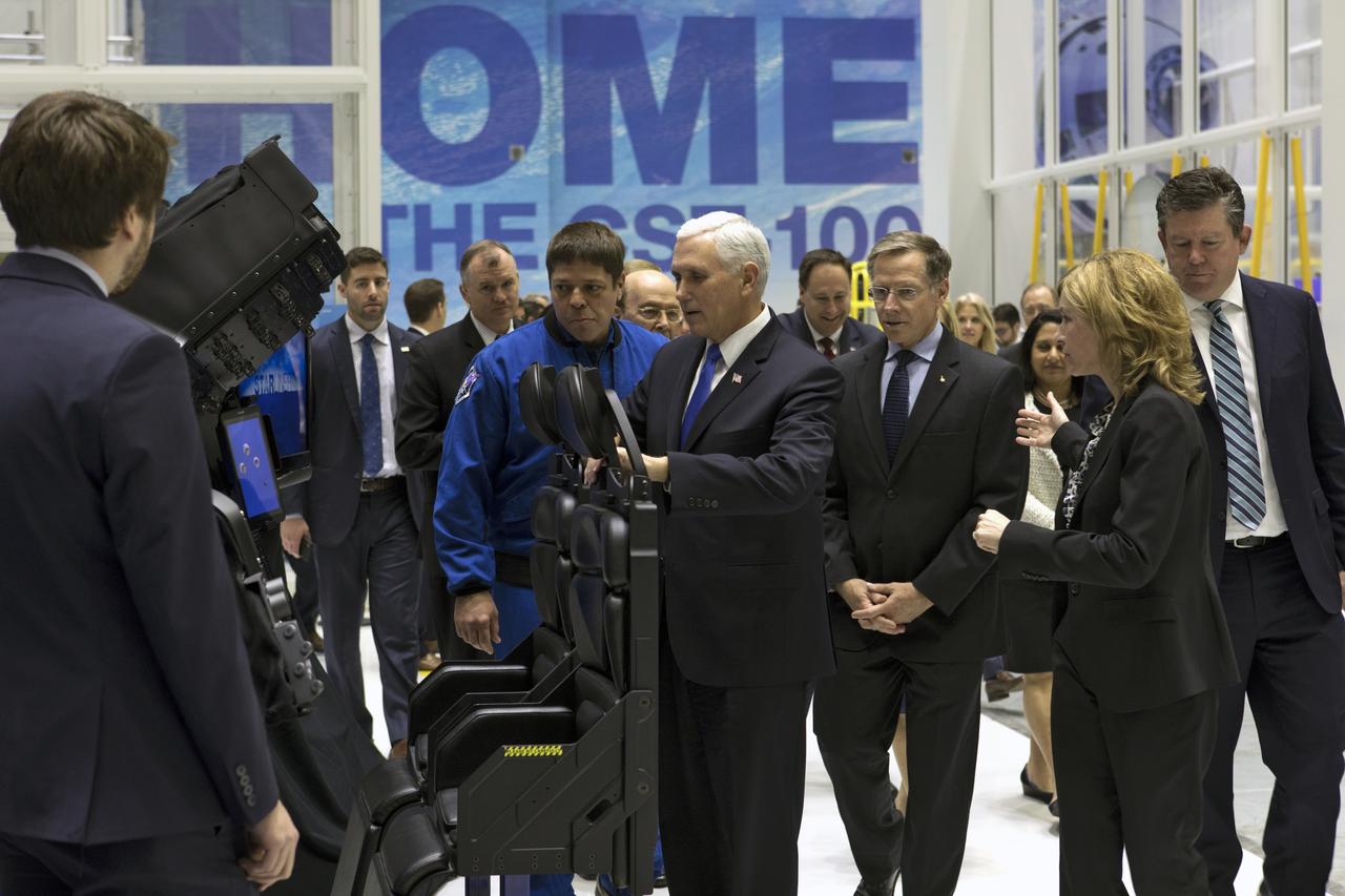 Vice President Mike Pence, center, NASA astronaut Bob Behnken, left, and Chris Ferguson, Boeing’s director of Crew and Mission Systems, tour the company’s Commercial Crew and Cargo Processing Facility at NASA's Kennedy Space Center in Florida, on Feb. 21, 2018. During his visit, Pence chaired a meeting of the National Space Council in the high bay of the center's Space Station Processing Facility. The council's role is to advise the president regarding national space policy and strategy, and review the nation's long-range goals for space activities.