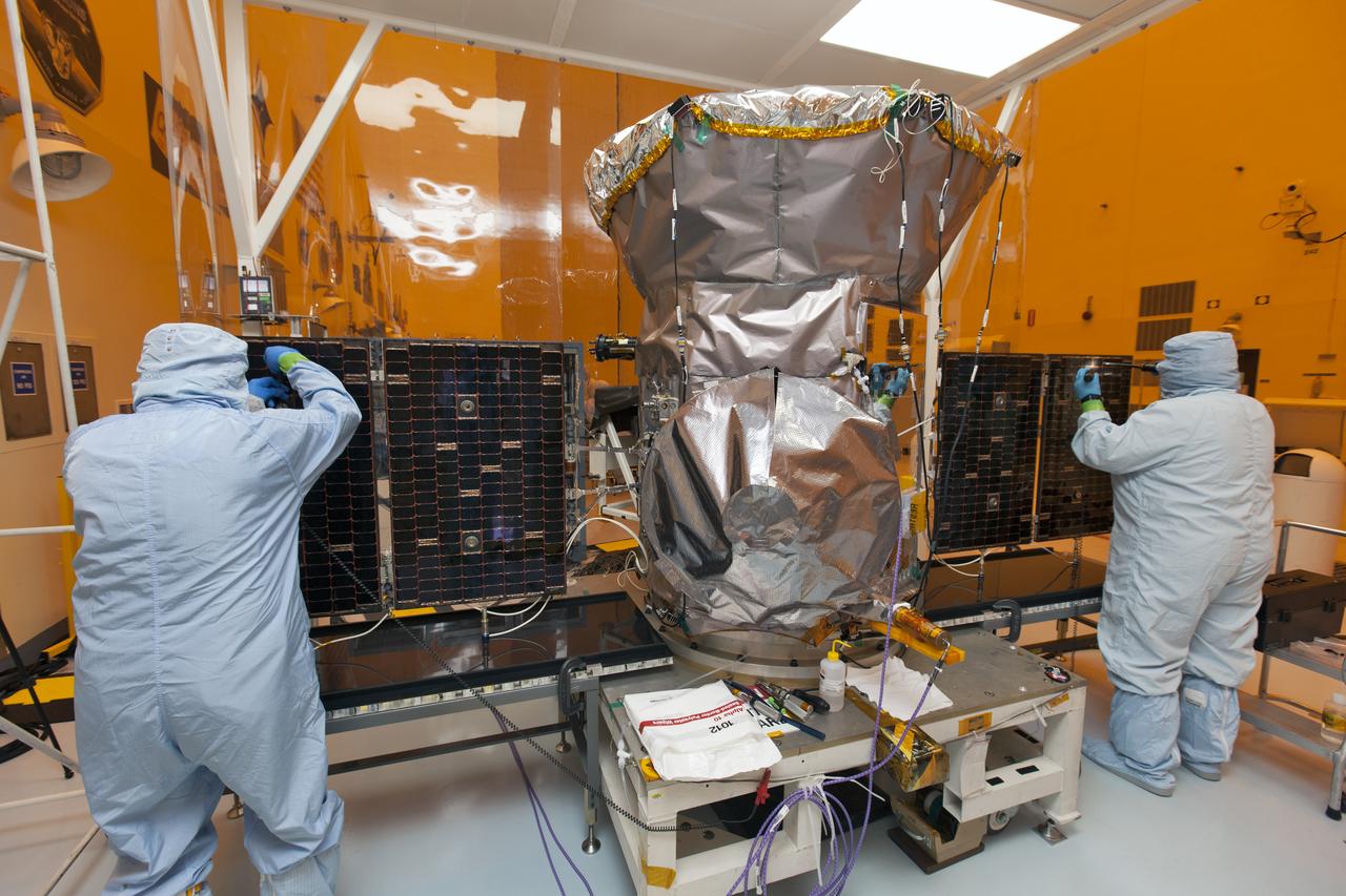 Technicians dressed in clean room suits check the solar panels, which have been deployed, on NASA's Transiting Exoplanet Survey Satellite (TESS) inside the Payload Hazardous Servicing Facility (PHSF) at the agency's Kennedy Space Center in Florida. Inside the PHSF, the satellite is being processed and prepared for its flight. TESS is scheduled to launch atop a SpaceX Falcon 9 rocket from Space Launch Complex 40 at Cape Canaveral Air Force Station. The satellite is the next step in NASA's search for planets outside our solar system, known as exoplanets. TESS is a NASA Astrophysics Explorer mission led and operated by MIT in Cambridge, Massachusetts, and managed by NASA’s Goddard Space Flight Center in Greenbelt, Maryland. Dr. George Ricker of MIT’s Kavli Institute for Astrophysics and Space Research serves as principal investigator for the mission. Additional partners include Orbital ATK, NASA’s Ames Research Center, the Harvard-Smithsonian Center for Astrophysics and the Space Telescope Science Institute. More than a dozen universities, research institutes and observatories worldwide are participants in the mission. NASA’s Launch Services Program is responsible for launch management. 