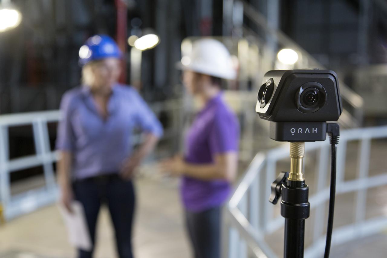 The camera in the foreground is recording NASA engineer Krista Shaffer, left, and Rachel Power of NASA’s Digital Expansion to Engage the Public (DEEP) Network inside Kennedy Space Center’s Vehicle Assembly Building during Introduce a Girl to Engineering Day. Held in conjunction with National Engineers Week and Girl Day, the event allowed students from throughout the nation to speak with female NASA scientists and technical experts.