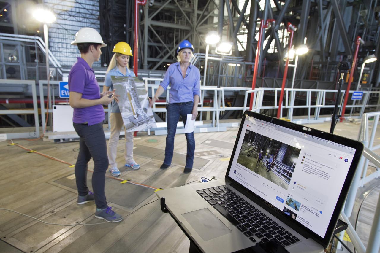 The laptop computer in the foreground displays Rachel Power, left, of NASA’s Digital Expansion to Engage the Public (DEEP) Network; Bethanne’ Hull, center, of NASA Outreach; and NASA engineer Krista Shaffer inside Kennedy Space Center’s Vehicle Assembly Building during Introduce a Girl to Engineering Day. Held in conjunction with National Engineers Week and Girl Day, the event allowed students from throughout the nation to speak with female NASA scientists and technical experts. 