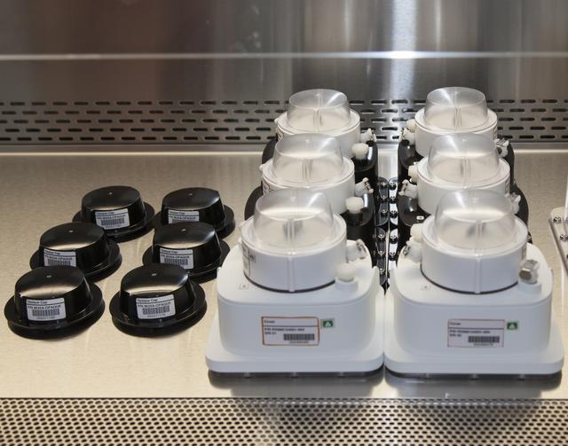 NASA image: Seed Placement into Veggie Pods