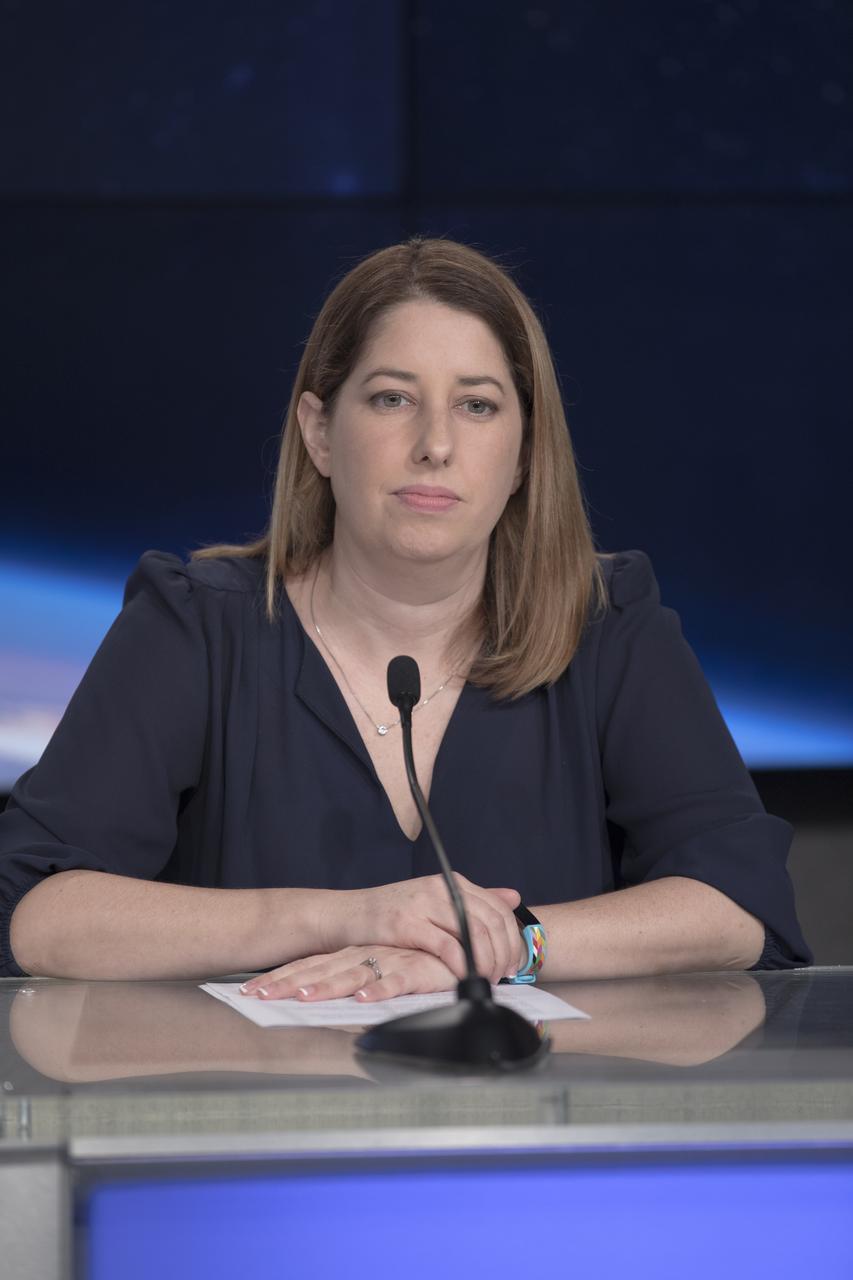 In the Kennedy Space Center's Press Site auditorium, Kristin Calhoun, a research scientist with NOAA's National Severe Storms Laboratory, speaks to members of the media at a mission briefing on National Oceanic and Atmospheric Administration's, or NOAA's, Geostationary Operational Environmental Satellite, or GOES-S. The spacecraft is the second satellite in a series of next-generation NOAA weather satellites. It will launch to a geostationary position over the U.S. to provide images of storms and help predict weather forecasts, severe weather outlooks, watches, warnings, lightning conditions and longer-term forecasting. GOES-S is slated to lift off at 5:02 p.m. EST on March 1, 2018 aboard a United Launch Alliance Atlas V rocket.