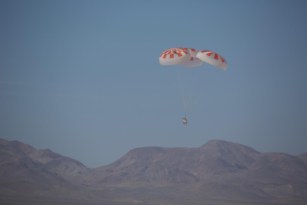 SpaceX performed its fourteenth overall parachute test supporting Crew Dragon development. This most recent exercise was the first of several planned parachute system qualification tests ahead of the spacecraft’s first crewed flight and resulted in the successful touchdown of Crew Dragon’s parachute system. During this test, a C-130 aircraft transported the parachute test vehicle, designed to achieve the maximum speeds that Crew Dragon could experience on re-entry, over the Mojave Desert in Southern California and dropped the vehicle from an altitude of 25,000 feet. The test demonstrated an off-nominal situation, deploying only one of the two drogue chutes and intentionally skipping a reefing stage on one of the four main parachutes, proving a safe landing in such a contingency scenario.
