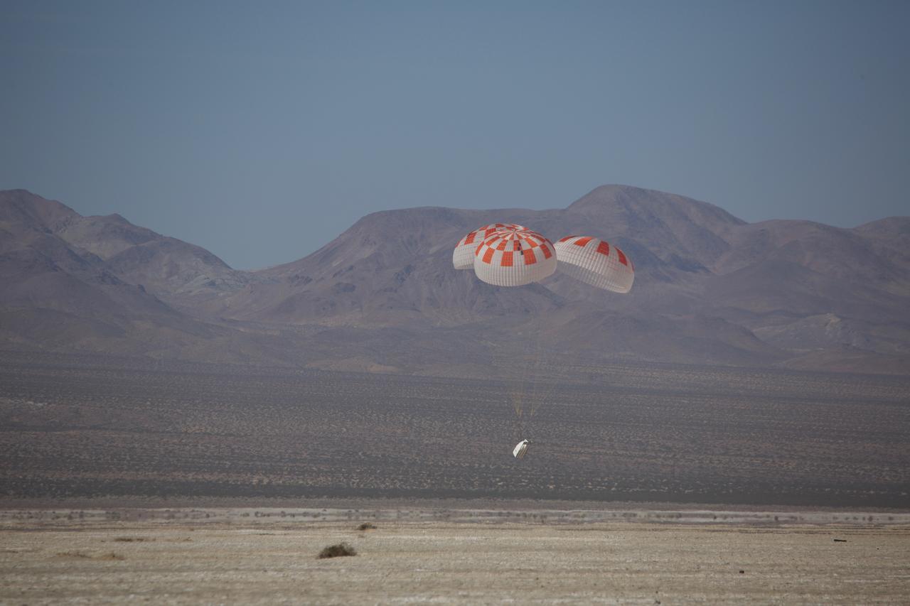 SpaceX performed its fourteenth overall parachute test supporting Crew Dragon development. This most recent exercise was the first of several planned parachute system qualification tests ahead of the spacecraft’s first crewed flight and resulted in the successful touchdown of Crew Dragon’s parachute system. During this test, a C-130 aircraft transported the parachute test vehicle, designed to achieve the maximum speeds that Crew Dragon could experience on re-entry, over the Mojave Desert in Southern California and dropped the vehicle from an altitude of 25,000 feet. The test demonstrated an off-nominal situation, deploying only one of the two drogue chutes and intentionally skipping a reefing stage on one of the four main parachutes, proving a safe landing in such a contingency scenario.
