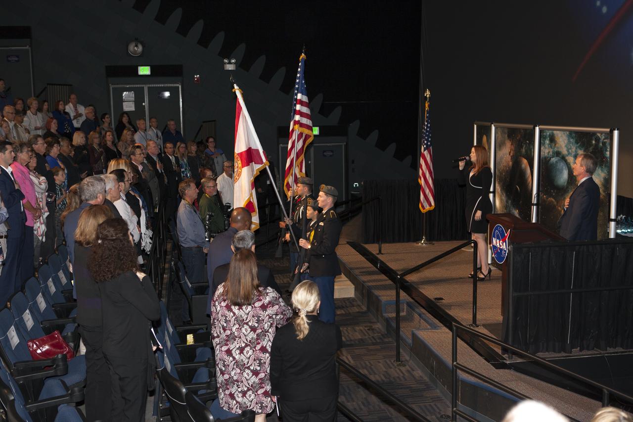 The color guard stands at attention as the national anthem is sung before the start of NASA Kennedy Space Center's annual Honor Awards ceremony inside the IMAX Theater at nearby Kennedy Space Center Visitor Complex in Florida. 