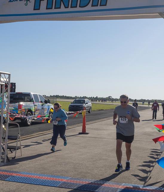 Kennedy Space Center Director Bob Cabana approaches the finish line at the KSC Walk Run on the Shuttle Landing Facility runway. The annual event, part of Kennedy’s Safety and Health Days, offers 10K, 5K and 2-mile options in the spirit of friendly competition. 