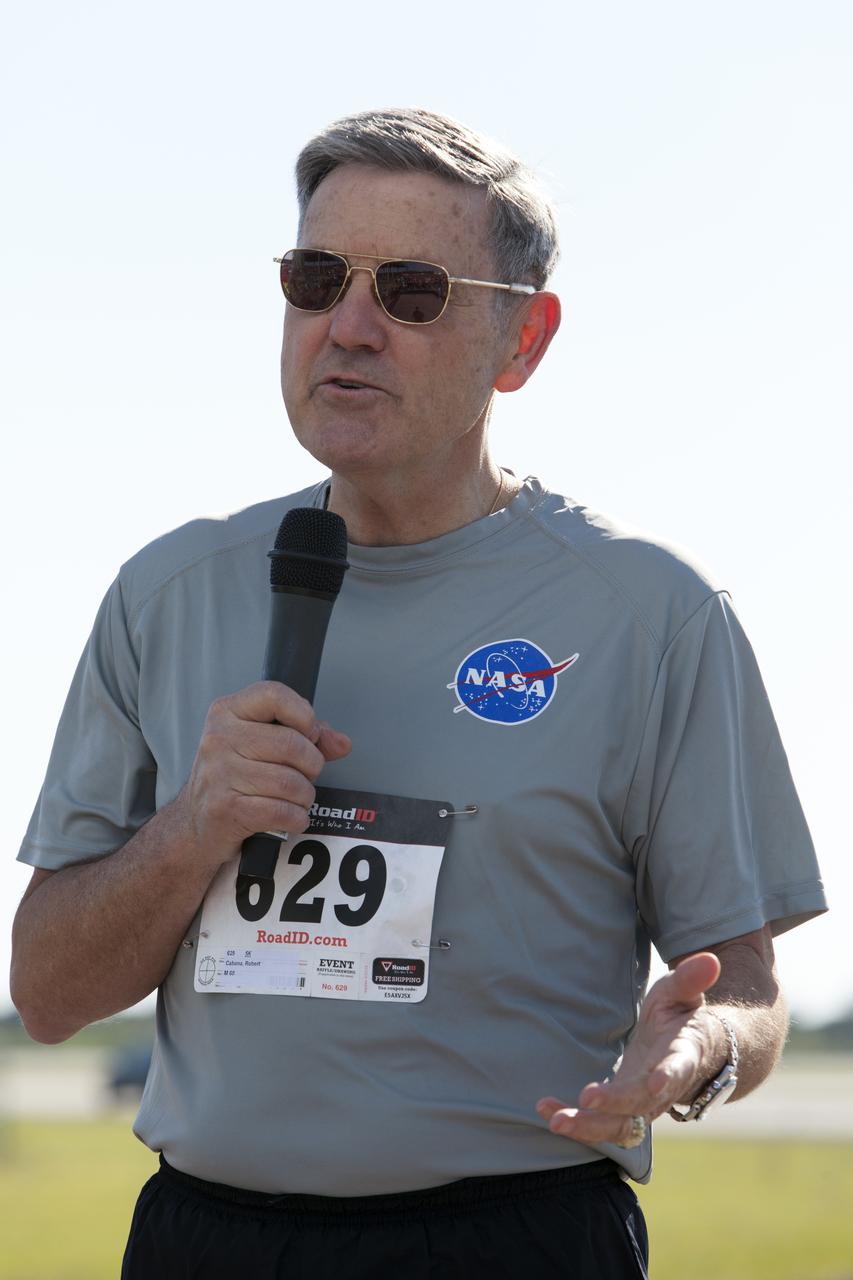 Kennedy Space Center Director Bob Cabana speaks to center employees and guests before the KSC Walk Run on the Shuttle Landing Facility runway. The annual event, part of Kennedy’s Safety and Health Days, offers 10K, 5K and 2-mile options in the spirit of friendly competition.