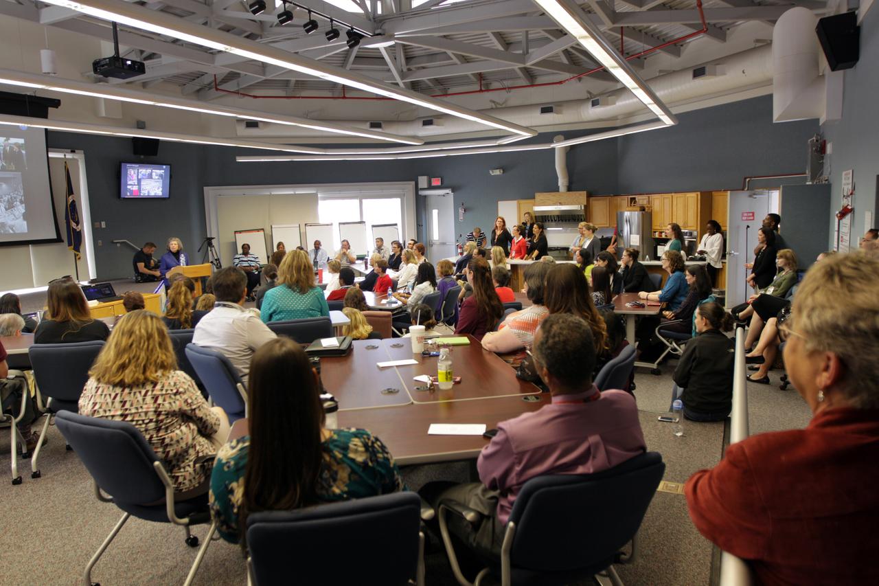 JoAnn Morgan, far left at the podium, former associate director of Kennedy Space Center, was the keynote speaker during a Women's History Month event at the center. With the theme "Nevertheless She Persisted," Morgan described her experience as the first female engineer working in the space program in the 1960s. Morgan was the first female in the Launch Control Center firing room during the Apollo 11 launch. The event was hosted by the center's Kennedy Networking Opportunities for Women (KNOW) and Launching Leaders organizations. The purpose of KNOW is to provide focus on issues such as employment, retention, promotion, training, career and personal development, education, and identify and eliminate barriers that hinder the advancement of women in the workforce.