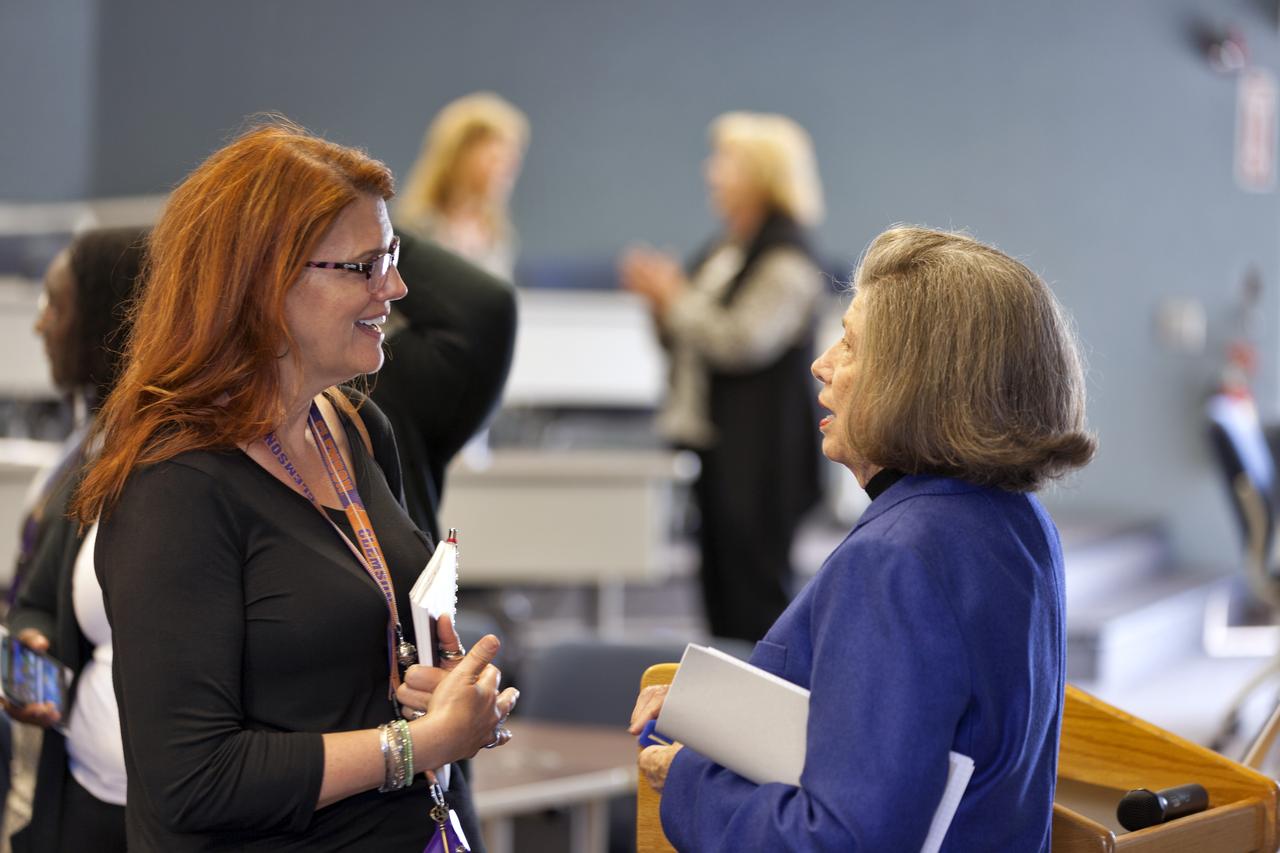 JoAnn Morgan, at right, former associate director of Kennedy Space Center, was the keynote speaker during a Women's History Month event at the center. With the theme "Nevertheless She Persisted," Morgan described her experience as the first female engineer working in the space program in the 1960s. Morgan was the first female in the Launch Control Center firing room during the Apollo 11 launch. Morgan is speaking to Charlie Blackwell-Thompson, the first female launch director, who will lead countdown and launch for Exploration Mission-1. The event was hosted by the center's Kennedy Networking Opportunities for Women (KNOW) and Launching Leaders organizations. The purpose of KNOW is to provide focus on issues such as employment, retention, promotion, training, career and personal development, education, and identify and eliminate barriers that hinder the advancement of women in the workforce. 