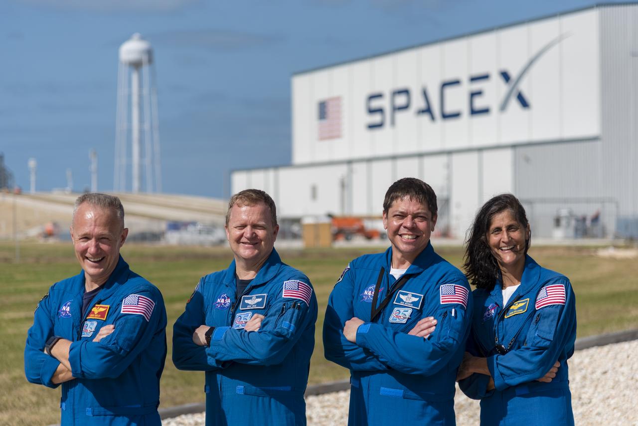 Commercial Crew Program astronauts, from the left Doug Hurley, Eric Boe, Bob Behnken and Suni Williams, pose just outside Launch Complex 39A at NASA's Kennedy Space Center in Florida. The astronauts toured the pad for an up-close look at modifications that are in work for the SpaceX Crew Dragon flight tests. The tower modifications included removal of the space shuttle era rotating service structure. Future integration of the crew access arm will allow for safe crew entry for launch and exit from the spacecraft in the unlikely event a pad abort is required.