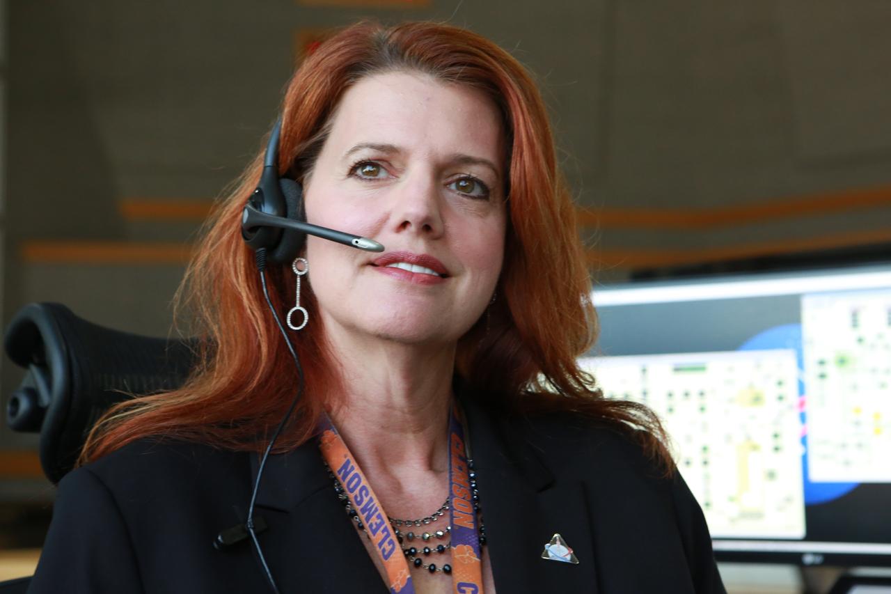 NASA Launch Director Charlie Blackwell-Thompson follows operations at her console in Firing Room 1 at the Kennedy Space Center's Launch Control Center during a countdown simulation for Exploration Mission 1. It was the agency's first simulation of a portion of the countdown for the first launch of a Space Launch System rocket and Orion spacecraft that will eventually take astronauts beyond low-Earth orbit to destinations such as the Moon and Mars.