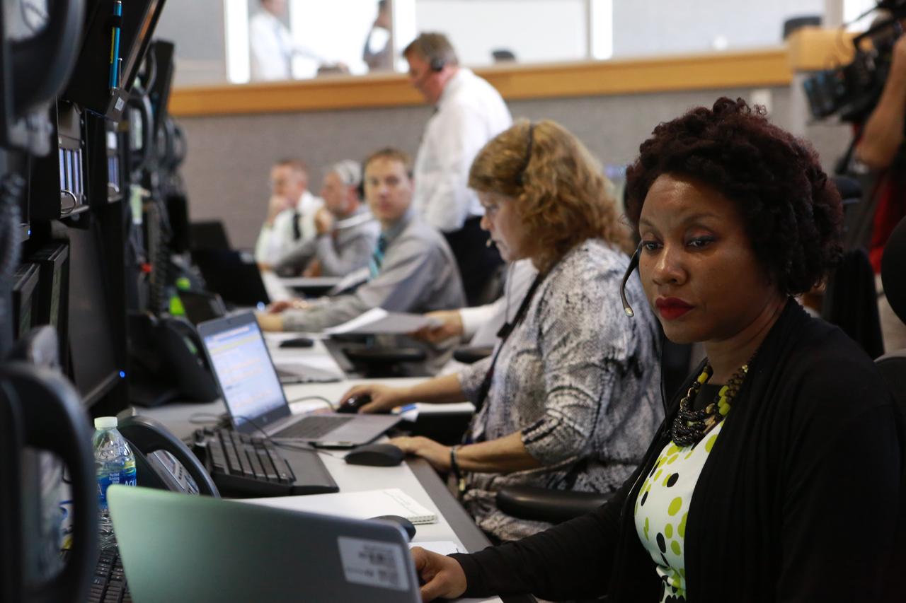 Space Launch System Test Conductors Roberta Wyrick, left, and Tracy Parks, both with Jacobs, NASA's Test and Operations Support Contractor, monitor operations from their consoles in Firing Room 1 at the Kennedy Space Center's Launch Control Center during a countdown simulation for Exploration Mission 1. It was the agency's first simulation of a portion of the countdown for the first launch of a Space Launch System rocket and Orion spacecraft that will eventually take astronauts beyond low-Earth orbit to destinations such as the Moon and Mars.