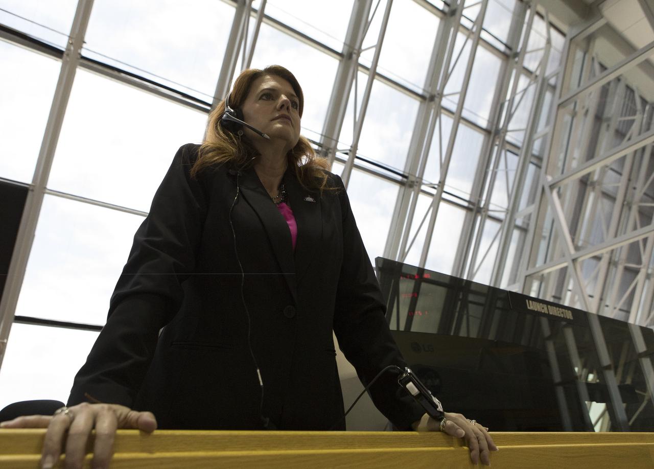 NASA Launch Director Charlie Blackwell-Thompson follows operations in Firing Room 1 at the Kennedy Space Center's Launch Control Center during a countdown simulation for Exploration Mission 1. It was the agency's first simulation of a portion of the countdown for the first launch of a Space Launch System rocket and Orion spacecraft that will eventually take astronauts beyond low-Earth orbit to destinations such as the Moon and Mars.