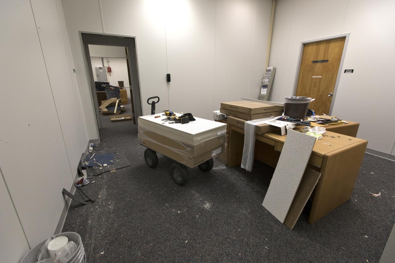 Modifications and upgrades are underway inside the Astronaut Crew Quarters in the Neil Armstrong Operations and Checkout Building at NASA's Kennedy Space Center in Florida. One of the support rooms is being prepped for upgrades, including new paint, carpeting and trim around the doors. The crew quarters are being prepared for the next generation of space explorers. The historic facility housed Apollo and space shuttle astronauts before and after their missions into space.