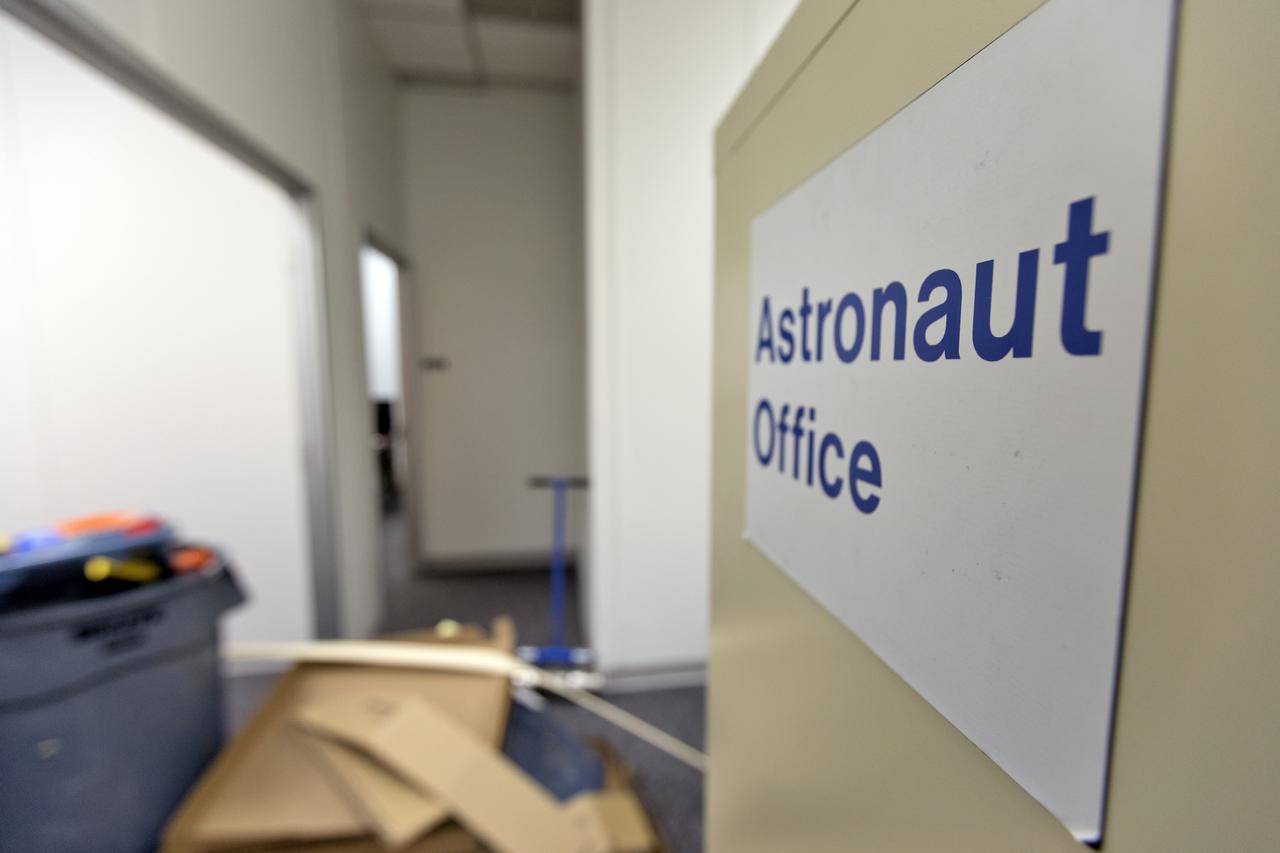 A sign marks the entrance to the Astronaut Office inside the Astronaut Crew Quarters in the Neil Armstrong Operations and Checkout Building at NASA's Kennedy Space Center in Florida. The crew quarters are being prepared for the next generation of space explorers. The walls are receiving fresh coats of paint and new flooring is being installed. The historic facility housed Apollo and space shuttle astronauts before and after their missions into space.