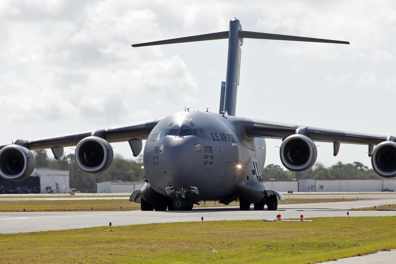 A U.S. Air Force C-5 transport aircraft arrives at Space Coast Regional Airport in Titusville, Florida, with NASA's Parker Solar Probe spacecraft aboard. The spacecraft will be offloaded and transported to the Astrotech processing facility near the agency's Kennedy Space Center. The Parker Solar Probe will launch on a United Launch Alliance Delta IV Heavy rocket from Space Launch Complex 37 at Cape Canaveral Air Force Station in Florida in July 2018. The mission will perform the closest-ever observations of a star when it travels through the Sun's atmosphere, called the corona. The probe will rely on measurements and imaging to revolutionize our understanding of the corona and the Sun-Earth connection. 