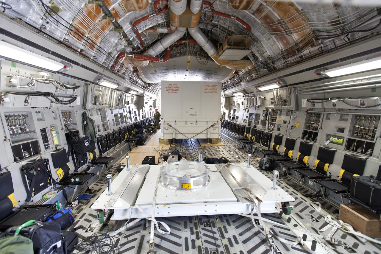 NASA's Parker Solar Probe, secured in its shipping container, arrives aboard a U.S. Air Force C-5 transport aircraft at Space Coast Regional Airport in Titusville, Florida. The spacecraft will be offloaded and transported to the Astrotech processing facility near the agency's Kennedy Space Center. The Parker Solar Probe will launch on a United Launch Alliance Delta IV Heavy rocket from Space Launch Complex 37 at Cape Canaveral Air Force Station in Florida in July 2018. The mission will perform the closest-ever observations of a star when it travels through the Sun's atmosphere, called the corona. The probe will rely on measurements and imaging to revolutionize our understanding of the corona and the Sun-Earth connection.