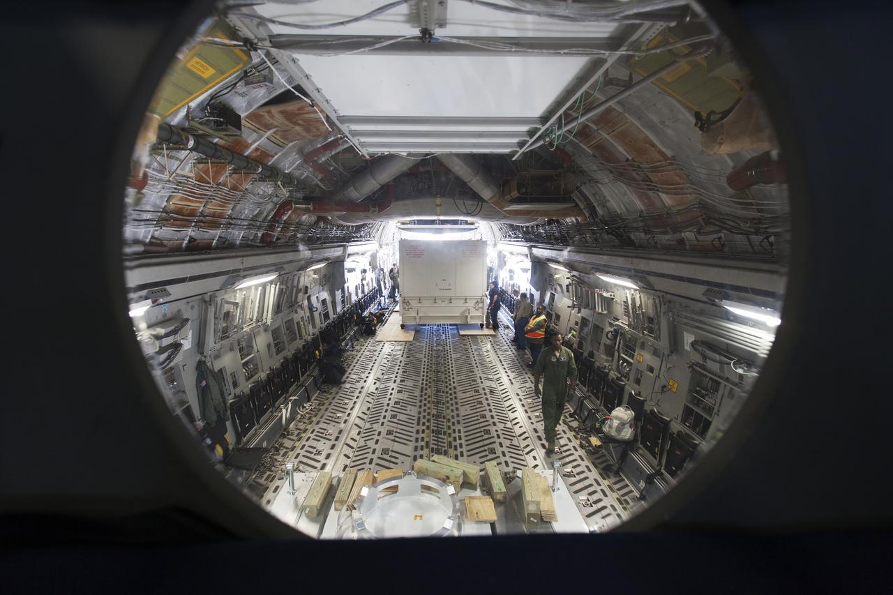 Preparations are underway to offload NASA's Parker Solar Probe spacecraft, secured in its shipping container, from a U.S. Air Force C-5 transport aircraft at Space Coast Regional Airport in Titusville, Florida. The spacecraft will be transported to the Astrotech processing facility near the agency's Kennedy Space Center. The Parker Solar Probe will launch on a United Launch Alliance Delta IV Heavy rocket from Space Launch Complex 37 at Cape Canaveral Air Force Station in Florida in July 2018. The mission will perform the closest-ever observations of a star when it travels through the Sun's atmosphere, called the corona. The probe will rely on measurements and imaging to revolutionize our understanding of the corona and the Sun-Earth connection. 