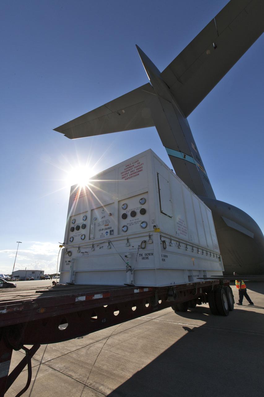 NASA's Parker Solar Probe, secured in its shipping container, has been offloaded from a U.S. Air Force C-5 transport aircraft at Space Coast Regional Airport in Titusville, Florida. The spacecraft will be transported to the Astrotech processing facility near the agency's Kennedy Space Center. The Parker Solar Probe will launch on a United Launch Alliance Delta IV Heavy rocket from Space Launch Complex 37 at Cape Canaveral Air Force Station in Florida in July 2018. The mission will perform the closest-ever observations of a star when it travels through the Sun's atmosphere, called the corona. The probe will rely on measurements and imaging to revolutionize our understanding of the corona and the Sun-Earth connection.