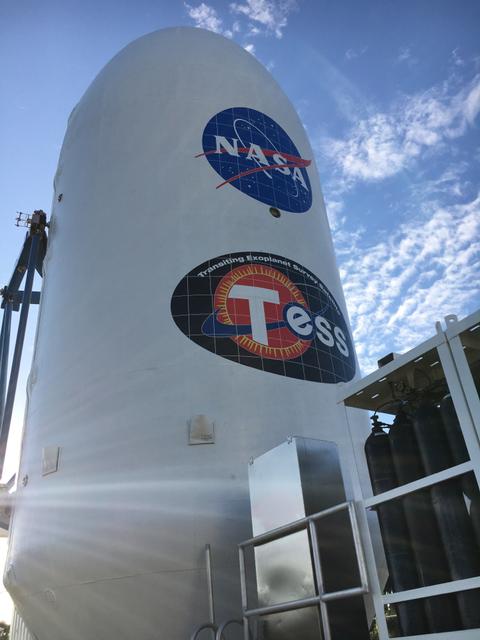 The payload fairing for NASA's Transiting Exoplanet Survey Satellite (TESS) is being moved to the Payload Hazardous Servicing Facility at the agency's Kennedy Space Center in Florida. Inside the facility, TESS will be encapsulated in the payload fairing. The satellite is scheduled to launch atop a SpaceX Falcon 9 rocket from Space Launch Complex 40 at Cape Canaveral Air Force Station on April 16. The satellite is the next step in NASA's search for planets outside our solar system, known as exoplanets. TESS is a NASA Astrophysics Explorer mission led and operated by MIT in Cambridge, Massachusetts, and managed by NASA’s Goddard Space Flight Center in Greenbelt, Maryland. Dr. George Ricker of MIT’s Kavli Institute for Astrophysics and Space Research serves as principal investigator for the mission. Additional partners include Orbital ATK, NASA’s Ames Research Center, the Harvard-Smithsonian Center for Astrophysics and the Space Telescope Science Institute. More than a dozen universities, research institutes and observatories worldwide are participants in the mission. NASA’s Launch Services Program is responsible for launch management. 