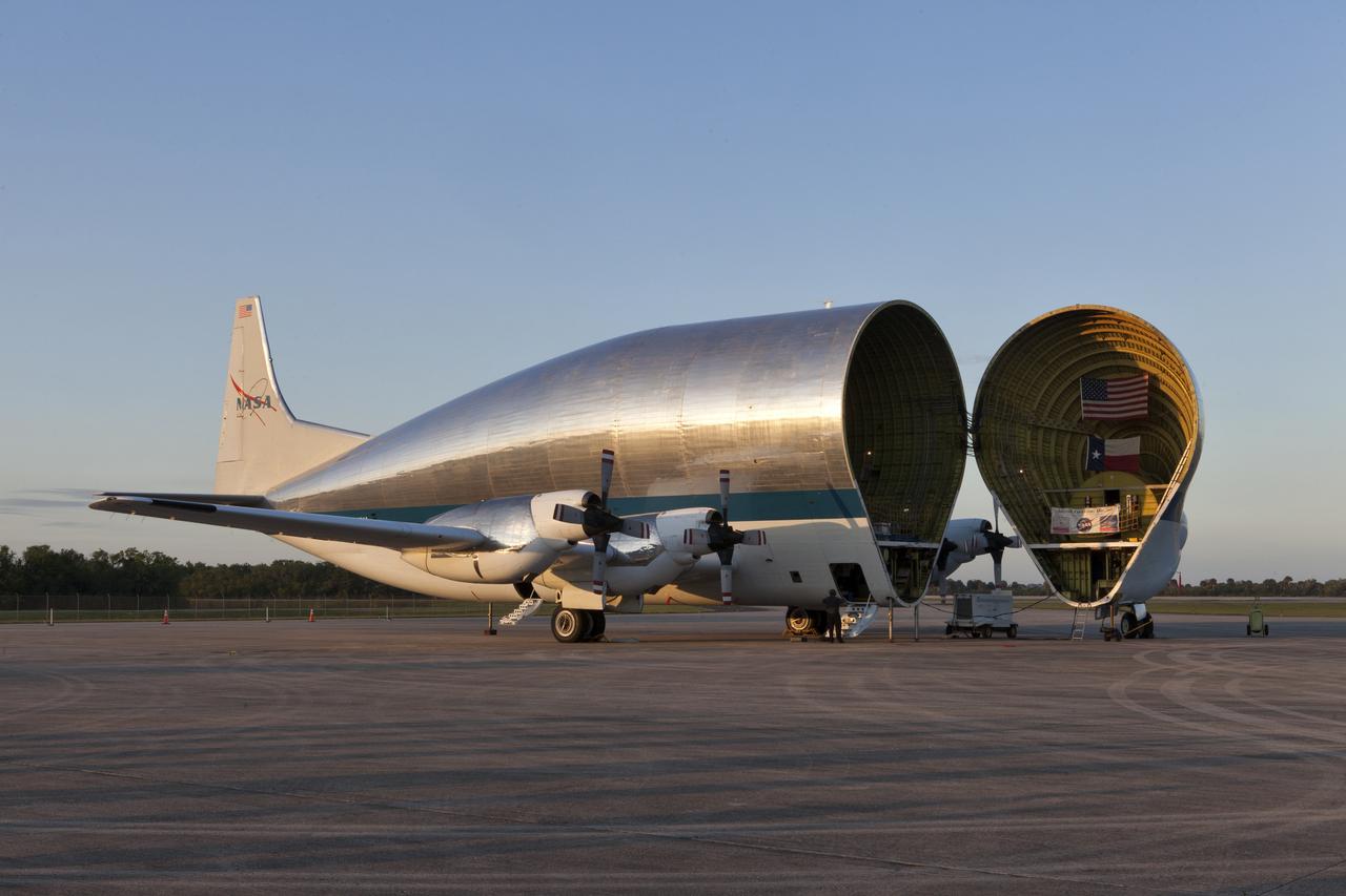 After arriving at the Shuttle Landing Facility at NASA's Kennedy Space Center in Florida, the agency's Super Guppy aircraft has been opened to begin offloading the Orion Stage Adapter (OSA), the second flight-hardware section of NASA's Space Launch System (SLS) rocket to arrive at Kennedy. The OSA will connect the Orion spacecraft to the upper part of the SLS, the interim cryogenic propulsion stage (ICPS). Both the OSA and ICPS are being stored for processing in the center's Space Station Processing Facility in preparation for Exploration Mission-1, the first uncrewed, integrated launch of the SLS rocket and Orion spacecraft. 