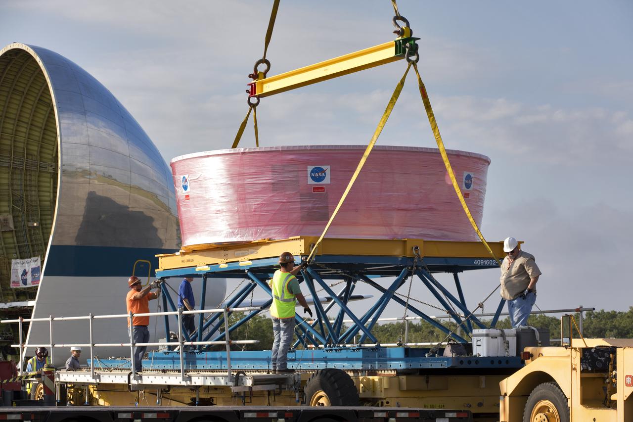 The Orion Stage Adapter (OSA) was moved out of NASA's Super Guppy aircraft onto a special payload handler at the Shuttle Landing Facility at Kennedy Space Center in Florida. The OSA is the second flight-hardware section of NASA's Space Launch System (SLS) rocket to arrive at Kennedy. The OSA will connect the Orion spacecraft to the upper part of the SLS, the interim cryogenic propulsion stage (ICPS). Both the OSA and ICPS are being stored for processing in the center's Space Station Processing Facility in preparation for Exploration Mission-1, the first uncrewed, integrated launch of the SLS rocket and Orion spacecraft.