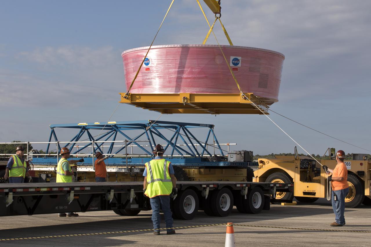The Orion Stage Adapter (OSA) is lifted by crane up from its transport platform at the Shuttle Landing Facility at NASA's Kennedy Space Center in Florida. The OSA is the second flight-hardware section of the agency's Space Launch System (SLS) rocket to arrive at Kennedy. The OSA will connect the Orion spacecraft to the upper part of the SLS, the interim cryogenic propulsion stage (ICPS). Both the OSA and ICPS are being stored for processing in the center's Space Station Processing Facility in preparation for Exploration Mission-1, the first uncrewed, integrated launch of the SLS rocket and Orion spacecraft. 