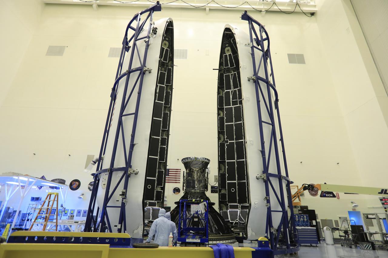 Technicians prepare NASA's Transiting Exoplanet Survey Satellite (TESS) for encapsulation in the SpaceX payload fairing inside the Payload Hazardous Servicing Facility at the agency's Kennedy Space Center in Florida. The satellite is scheduled to launch atop a SpaceX Falcon 9 rocket from Space Launch Complex 40 at Cape Canaveral Air Force Station on April 16. The satellite is the next step in NASA's search for planets outside our solar system, known as exoplanets. TESS is a NASA Astrophysics Explorer mission led and operated by MIT in Cambridge, Massachusetts, and managed by NASA’s Goddard Space Flight Center in Greenbelt, Maryland. Dr. George Ricker of MIT’s Kavli Institute for Astrophysics and Space Research serves as principal investigator for the mission. Additional partners include Orbital ATK, NASA’s Ames Research Center, the Harvard-Smithsonian Center for Astrophysics and the Space Telescope Science Institute. More than a dozen universities, research institutes and observatories worldwide are participants in the mission. NASA’s Launch Services Program is responsible for launch management. 