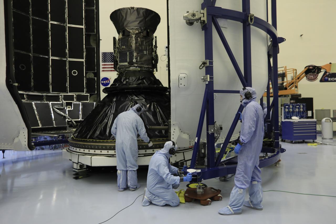 Technicians prepare NASA's Transiting Exoplanet Survey Satellite (TESS) for encapsulation in the SpaceX payload fairing inside the Payload Hazardous Servicing Facility at the agency's Kennedy Space Center in Florida. The satellite is scheduled to launch atop a SpaceX Falcon 9 rocket from Space Launch Complex 40 at Cape Canaveral Air Force Station on April 16. The satellite is the next step in NASA's search for planets outside our solar system, known as exoplanets. TESS is a NASA Astrophysics Explorer mission led and operated by MIT in Cambridge, Massachusetts, and managed by NASA’s Goddard Space Flight Center in Greenbelt, Maryland. Dr. George Ricker of MIT’s Kavli Institute for Astrophysics and Space Research serves as principal investigator for the mission. Additional partners include Orbital ATK, NASA’s Ames Research Center, the Harvard-Smithsonian Center for Astrophysics and the Space Telescope Science Institute. More than a dozen universities, research institutes and observatories worldwide are participants in the mission. NASA’s Launch Services Program is responsible for launch management. 