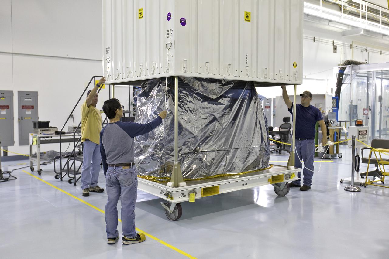 In the Space Station Processing Facility at NASA's Kennedy Space Center in Florida, the ECOsystem Spaceborne Thermal Radiometer Experiment on Space Station (ECOSTRESS) is removed from its shipping container. ECOSTRESS is designed to monitor one of the most basic processes in living plants: the loss of water through the tiny pores in leaves. ECOSTRESS will launch to the International Space Station aboard a Dragon spacecraft launched by a Falcon 9 rocket on the SpaceX CRS-15 mission in June 2018.
