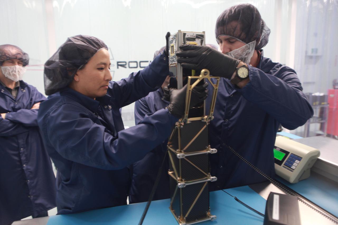 The goal of the CHOMPTT mission is to demonstrate new technologies that could be used for navigation and satellite networking in deep space. For future explorers and colonizers of the Moon or Mars, navigation systems like GPS here on Earth, will be essential. The key idea behind CHOMPTT is to use lasers to transfer time code data over long distances instead of radio waves. Because lasers can be more tightly beamed compared to radio waves, more of the transmitted energy reaches its intended target, making them more power-efficient. CHOMPTT takes advantage of this and of new miniature but very stable atomic clocks to produce a timing system with performance similar to that of GPS, but in a very compact and power efficient form factor. We will use a pulsed laser system, located at the Kennedy Space Center that will be synchronized with an atomic clock. Laser pulses will propagate from the ground to the orbiting CHOMPTT CubeSat and back. By precisely measuring the time of emission and detection of these pulses on the ground and in space we can calculate the time discrepancy between the ground atomic clock and the atomic clock on CHOMPTT. Our goal is to do this with an accuracy of 0.2 billionths of a second, or the time it takes light to travel just 6 centimeters. In the future, we envision using this technology on constellations or swarms of small satellites, for example orbiting the Moon, to equip them with precision navigation, networking, and ranging capabilities. CHOMPTT is a collaboration between the University of Florida and the NASA Ames Research Center. The CHOMPTT precision timing payload was designed and built by the Precision Space Systems Lab at the University of Florida, while the 3U CubeSat bus that has prior flight heritage, was provided by NASA Ames. The CHOMPTT mission has been funded by the Air Force Research Lab and by NASA.