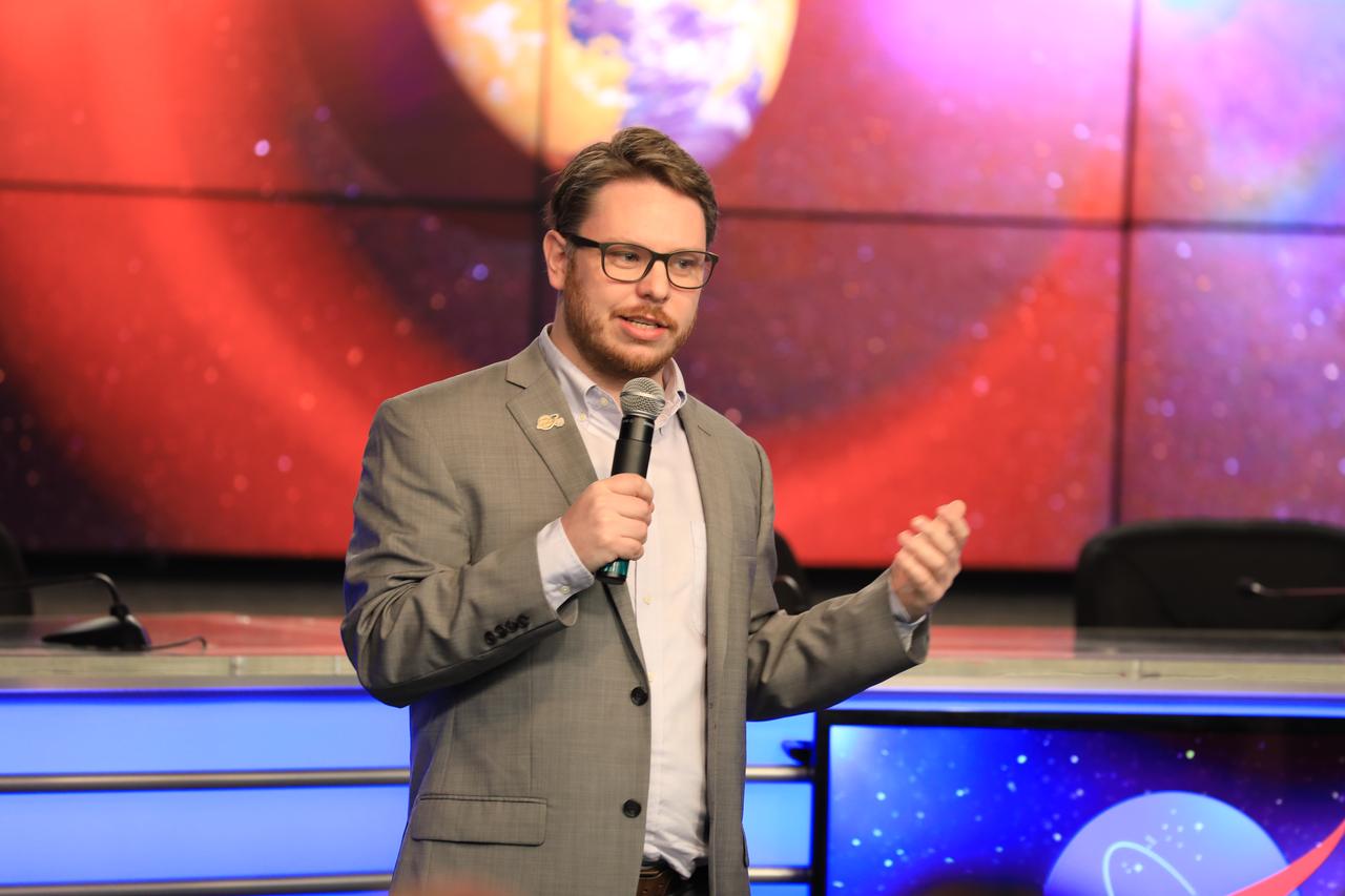 NASA and industry leaders speak to NASA Social participants about the agency's Transiting Exoplanet Survey Satellite (TESS) in the Press Site auditorium at Kennedy Space Center in Florida. Speaking to the group is Tom Barclay, TESS scientist, NASA’s Goddard Space Flight Center. TESS is the next step in the search for planets outside of our solar system. The mission will find exoplanets that periodically block part of the light from their host stars, events called transits. The satellite will survey the nearest and brightest stars for two years to search for transiting exoplanets. TESS will launch on a SpaceX Falcon 9 rocket from Space Launch Complex 40 at Cape Canaveral Air Force Station no earlier than 6:32 p.m. EDT on Monday, April 16. 