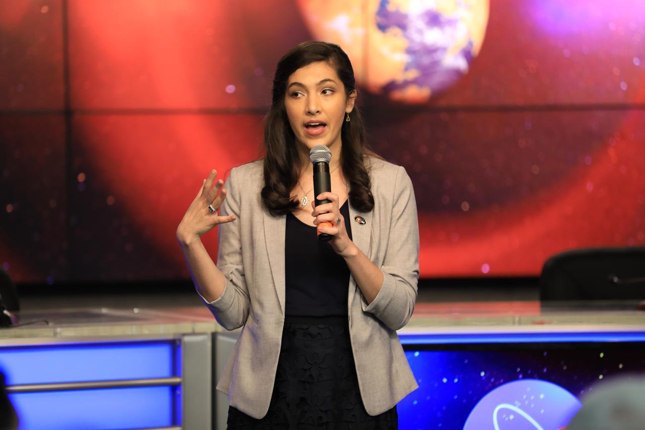 NASA and industry leaders speak to NASA Social participants about the agency's Transiting Exoplanet Survey Satellite (TESS) in the Press Site auditorium at Kennedy Space Center in Florida. Speaking to the group is Natalia Guerrero, TESS researcher, Massachusetts Institute of Technology. TESS is the next step in the search for planets outside of our solar system. The mission will find exoplanets that periodically block part of the light from their host stars, events called transits. The satellite will survey the nearest and brightest stars for two years to search for transiting exoplanets. TESS will launch on a SpaceX Falcon 9 rocket from Space Launch Complex 40 at Cape Canaveral Air Force Station no earlier than 6:32 p.m. EDT on Monday, April 16.