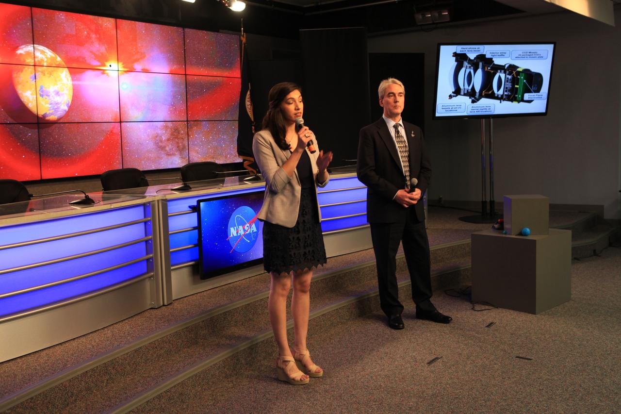 NASA and industry leaders speak to NASA Social participants about the agency's Transiting Exoplanet Survey Satellite (TESS) in the Press Site auditorium at Kennedy Space Center in Florida. Speaking to the group, from left are Natalia Guerrero, TESS researcher, Massachusetts Institute of Technology, and Robert Lockwood, TESS Spacecraft Program Manager, Orbital ATK. TESS is the next step in the search for planets outside of our solar system. The mission will find exoplanets that periodically block part of the light from their host stars, events called transits. The satellite will survey the nearest and brightest stars for two years to search for transiting exoplanets. TESS will launch on a SpaceX Falcon 9 rocket from Space Launch Complex 40 at Cape Canaveral Air Force Station no earlier than 6:32 p.m. EDT on Monday, April 16. 