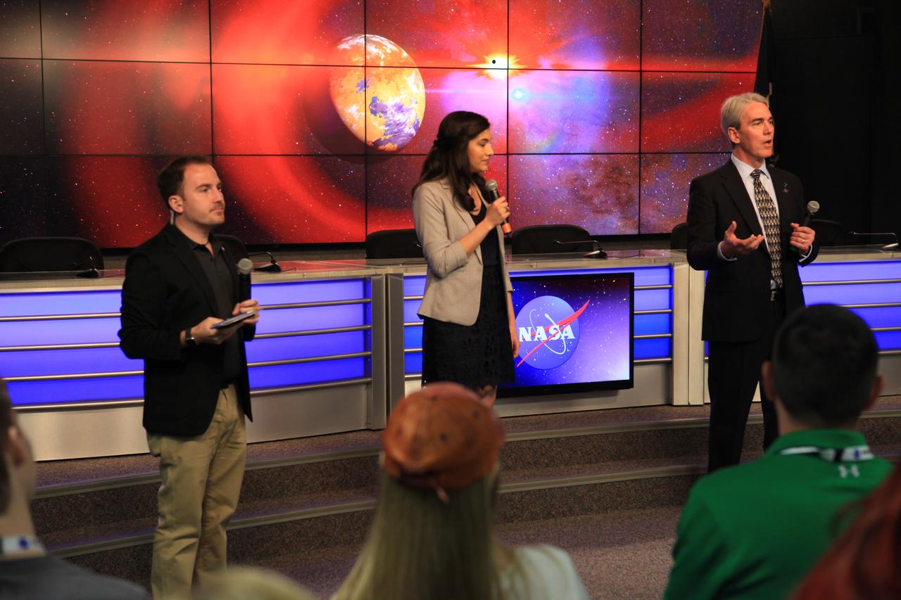 NASA and industry leaders speak to NASA Social participants about the agency's Transiting Exoplanet Survey Satellite (TESS) in the Press Site auditorium at Kennedy Space Center in Florida. Speaking to the group from center are Natalia Guerrero, TESS researcher, Massachusetts Institute of Technology, and Robert Lockwood, TESS Spacecraft Program Manager, Orbital ATK. At far left is Jason Townsend, NASA Communications. TESS is the next step in the search for planets outside of our solar system. The mission will find exoplanets that periodically block part of the light from their host stars, events called transits. The satellite will survey the nearest and brightest stars for two years to search for transiting exoplanets. TESS will launch on a SpaceX Falcon 9 rocket from Space Launch Complex 40 at Cape Canaveral Air Force Station no earlier than 6:32 p.m. EDT on Monday, April 16. 